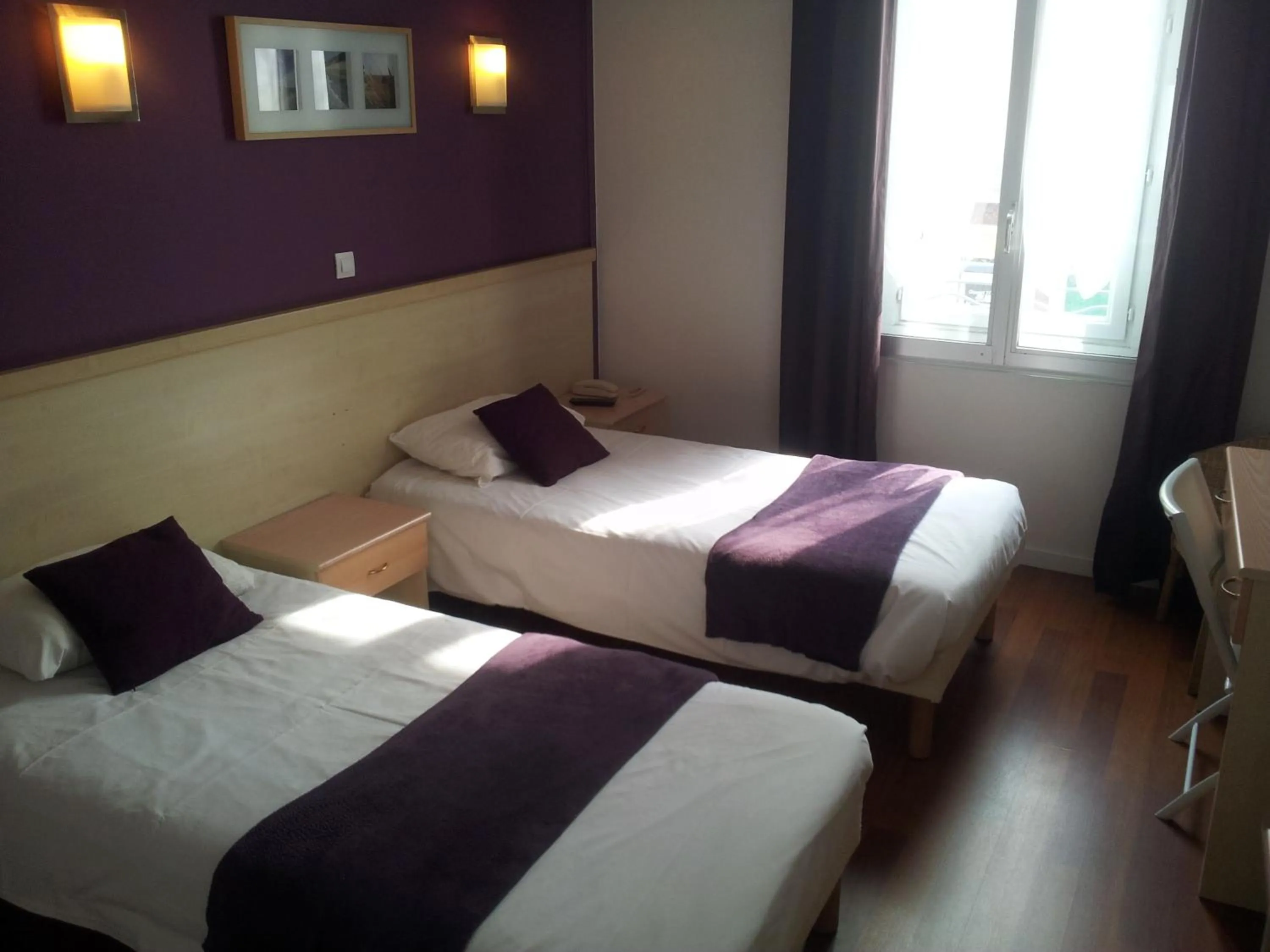 Photo of the whole room, Bed in Hôtel Du Midi