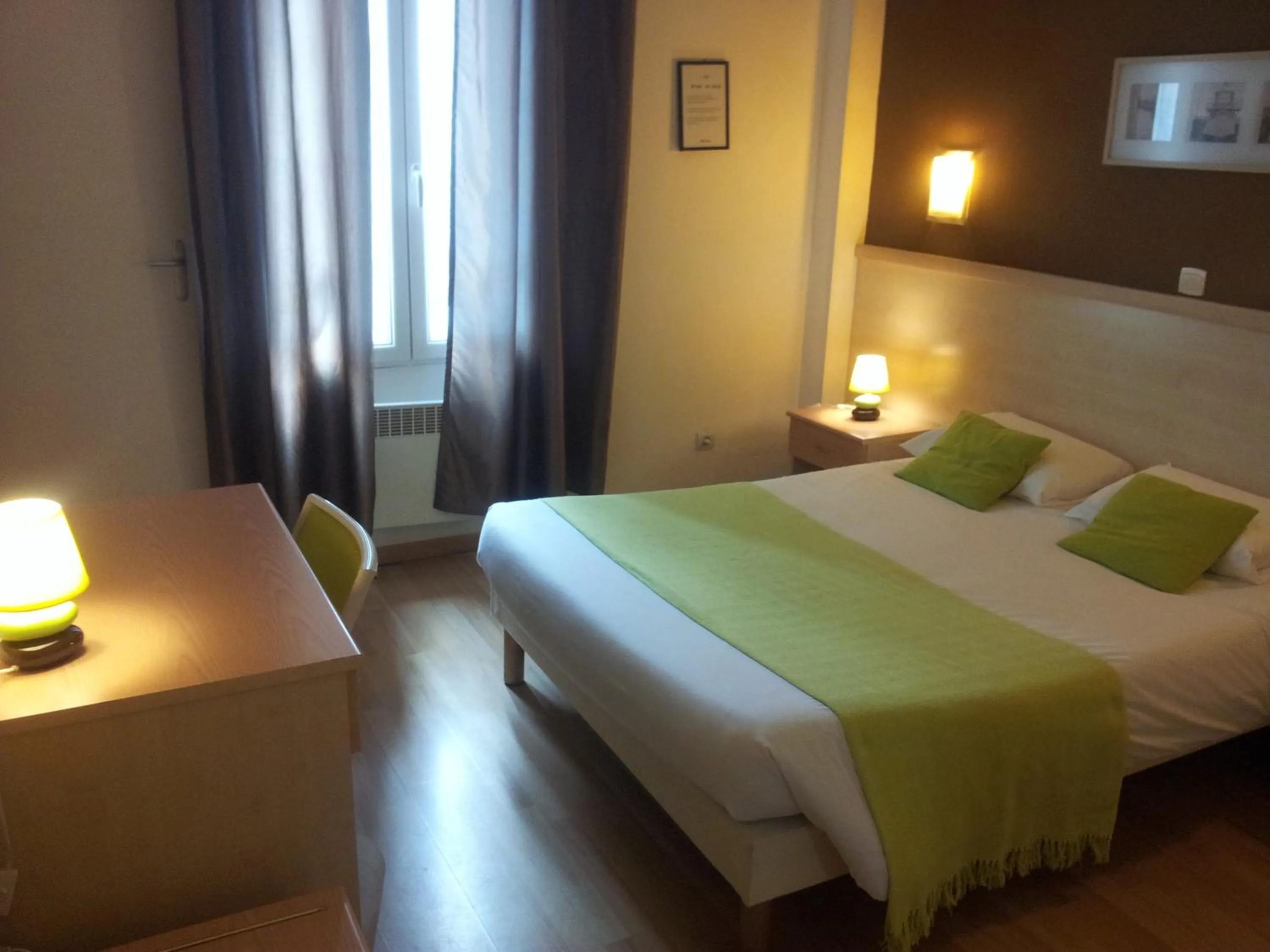 Photo of the whole room, Bed in Hôtel Du Midi