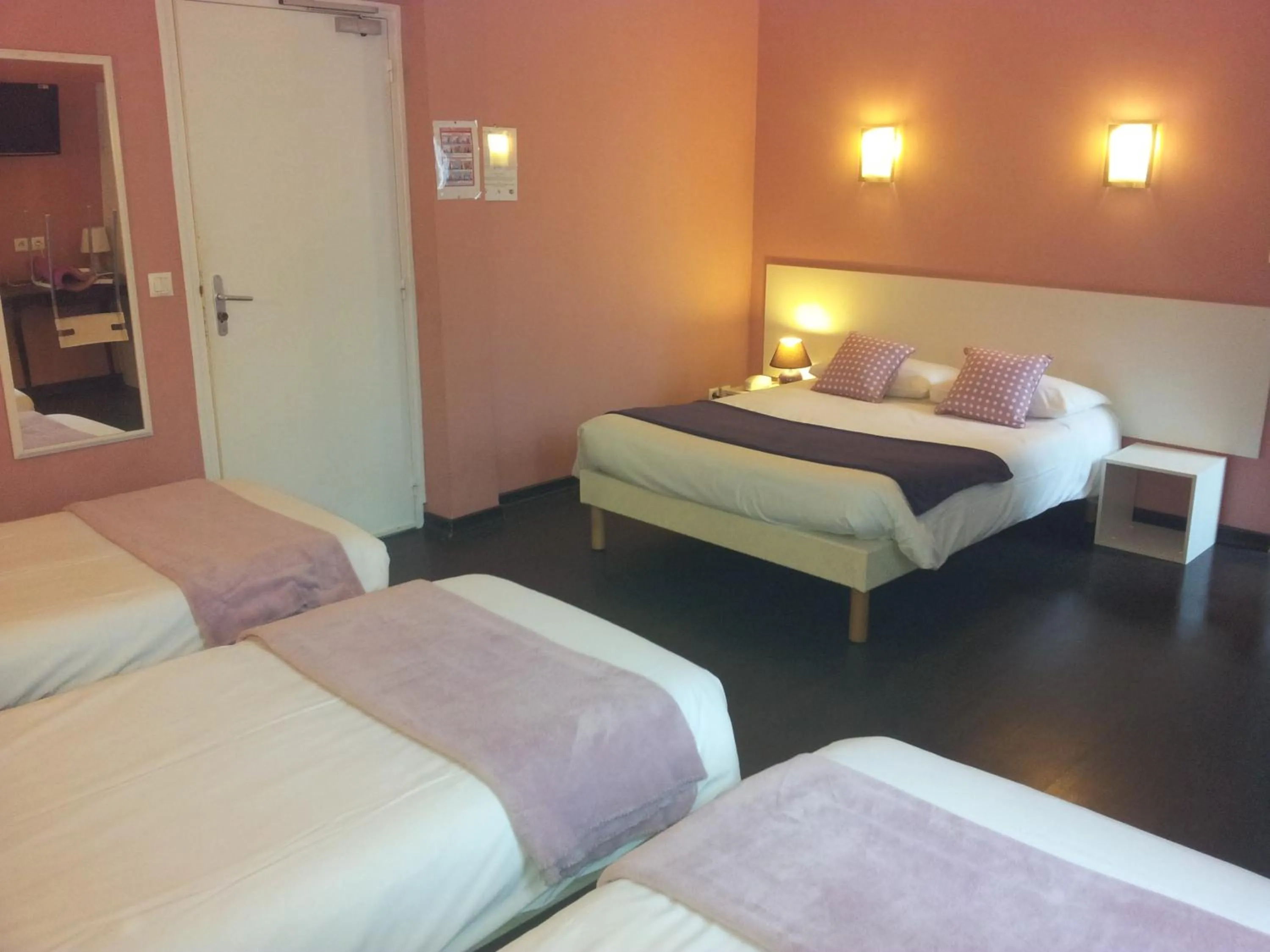 Photo of the whole room, Bed in Hôtel Du Midi