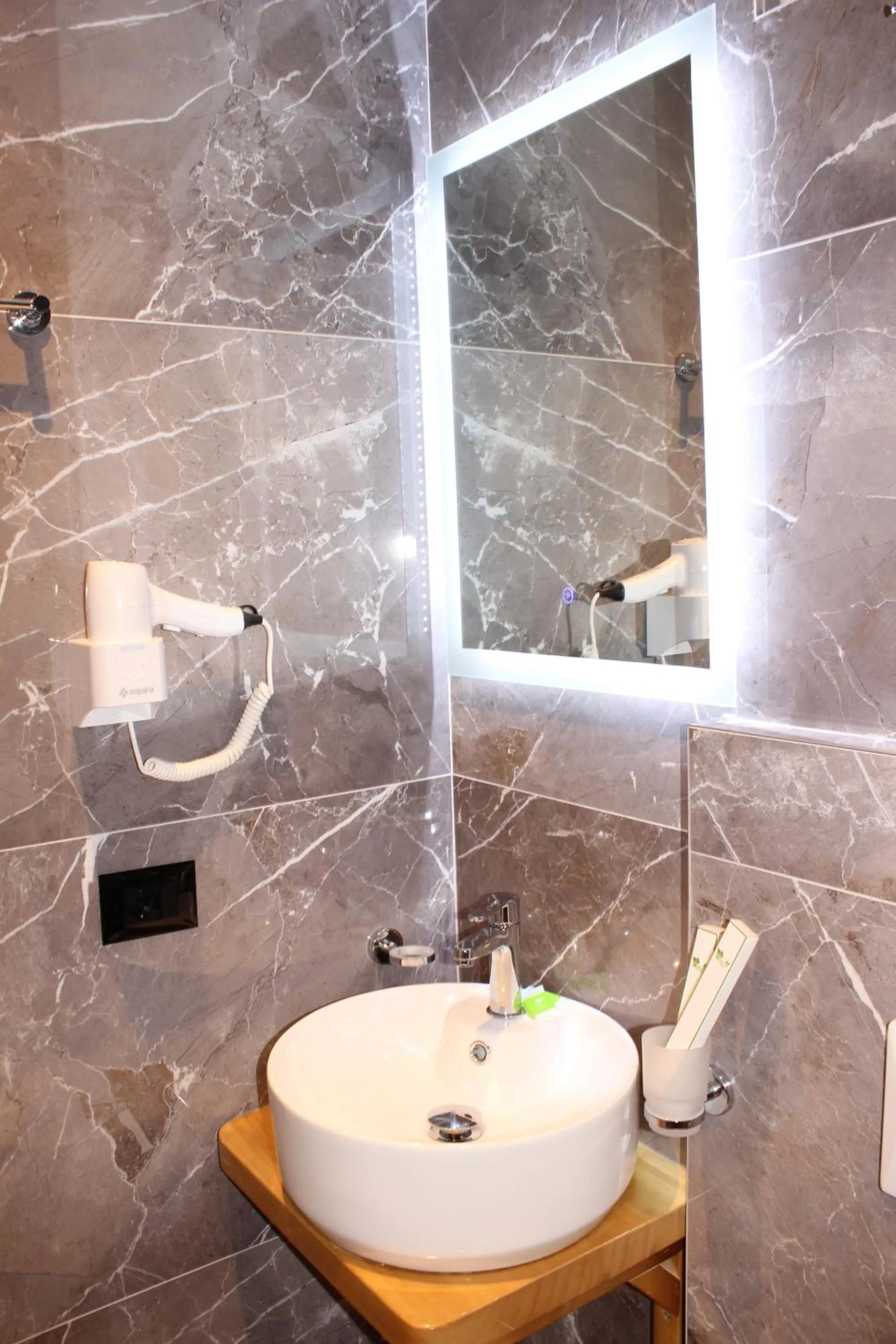 Shower in Bebi Hotel And Apartments