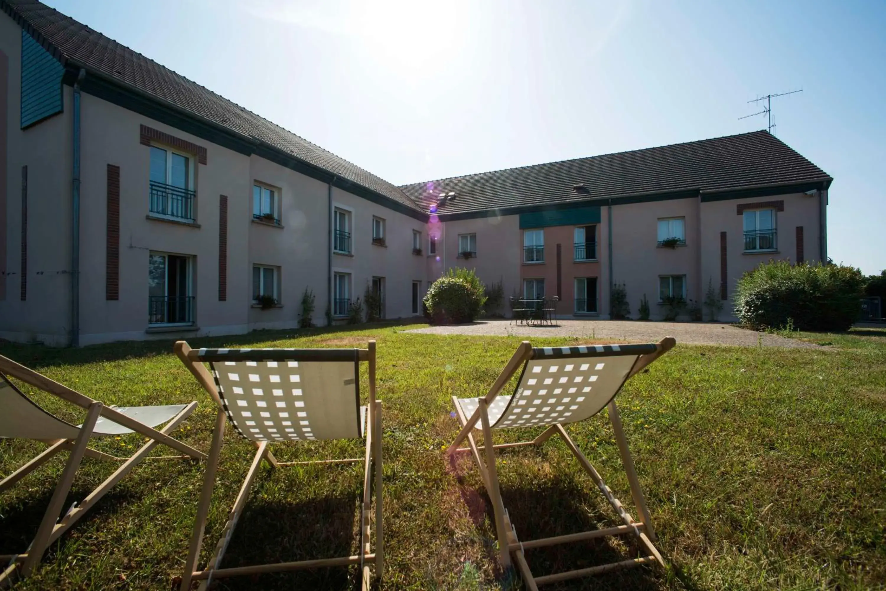 Property building in Brit Hotel Du Perche Property building in Brit Hotel Du Perche