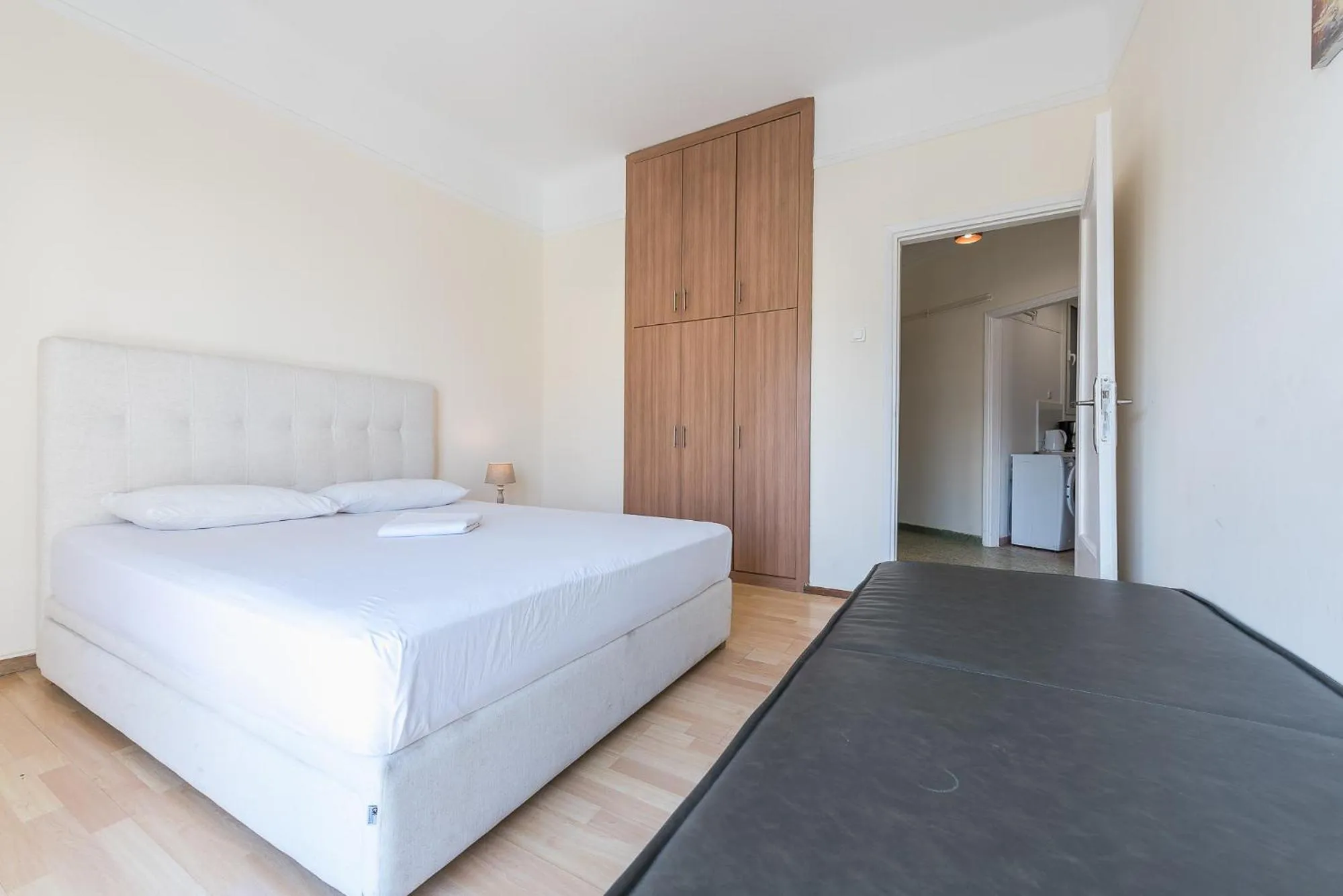 Bed in Super Paradise Apartments