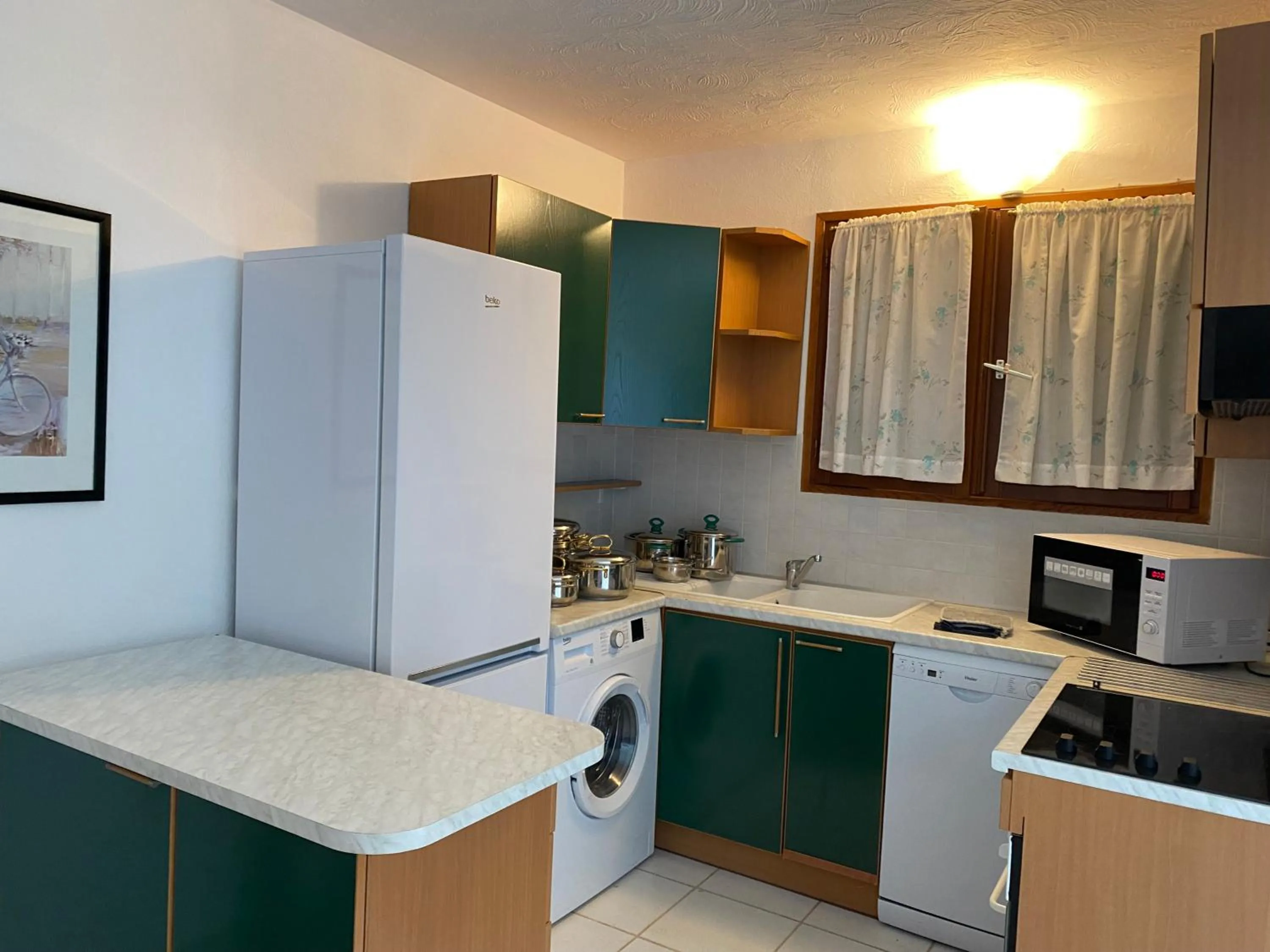 Kitchen or kitchenette in Résidence Playa Del'Oro