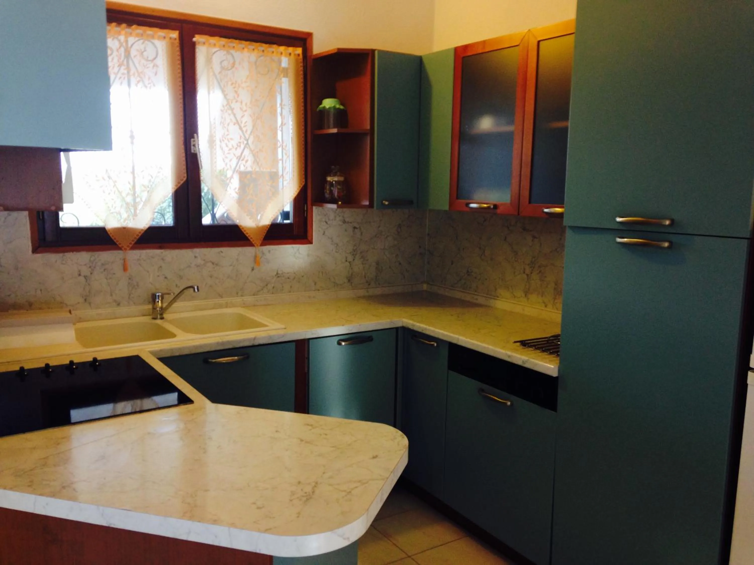 Kitchen or kitchenette in Résidence Playa Del'Oro