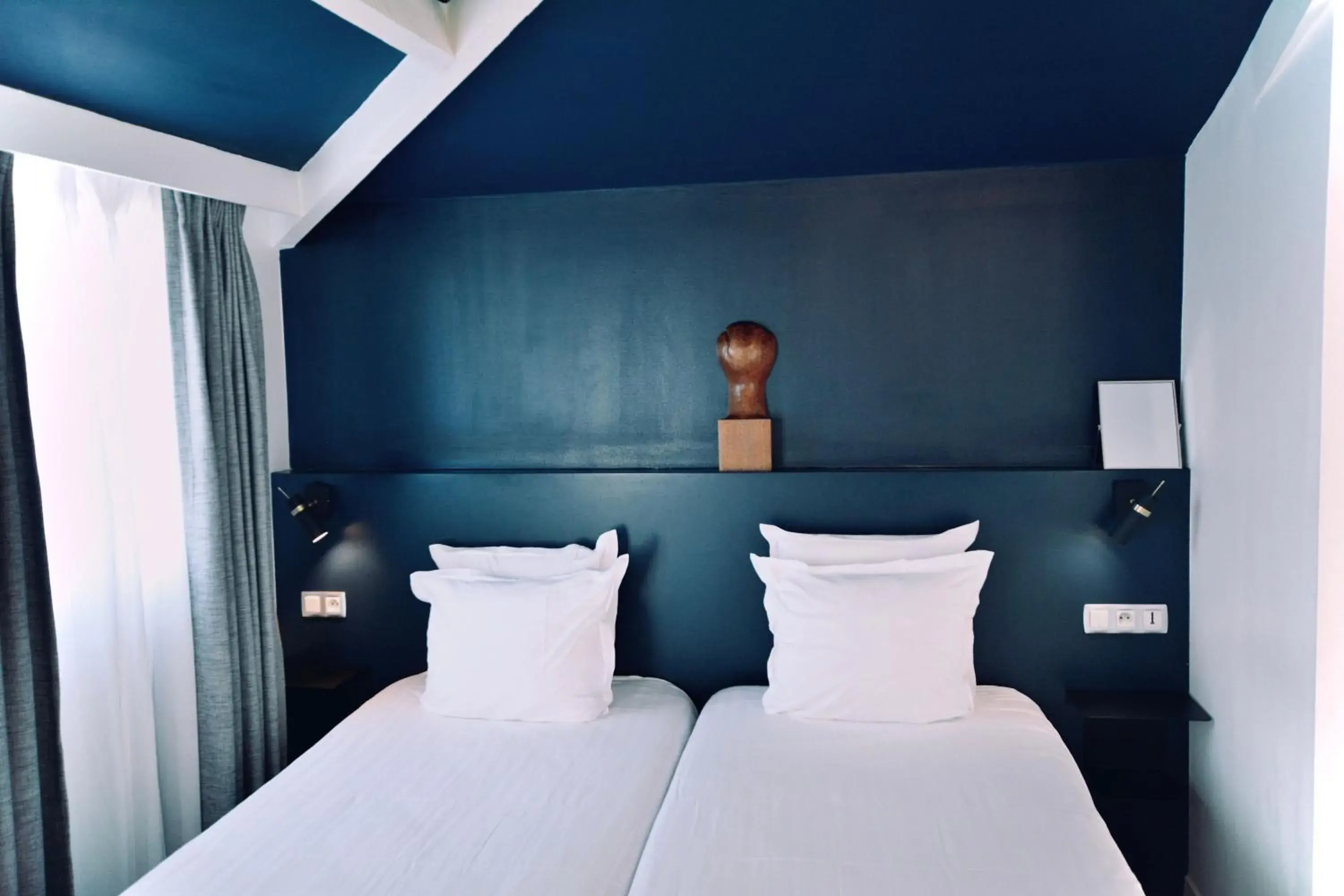 Bed in Hôtel Lucien Bed in Hôtel Lucien