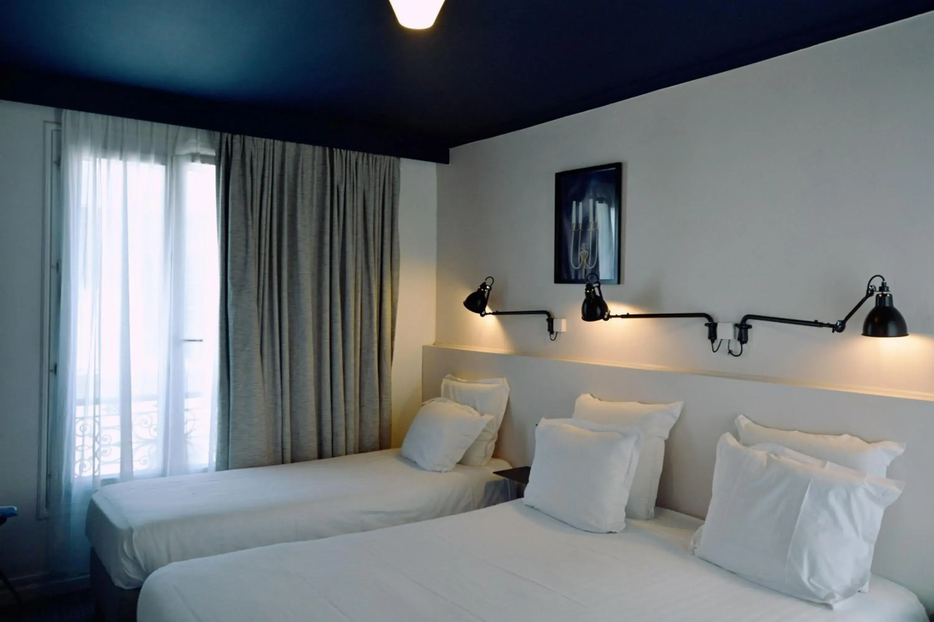 Bed in Hôtel Lucien Bed in Hôtel Lucien