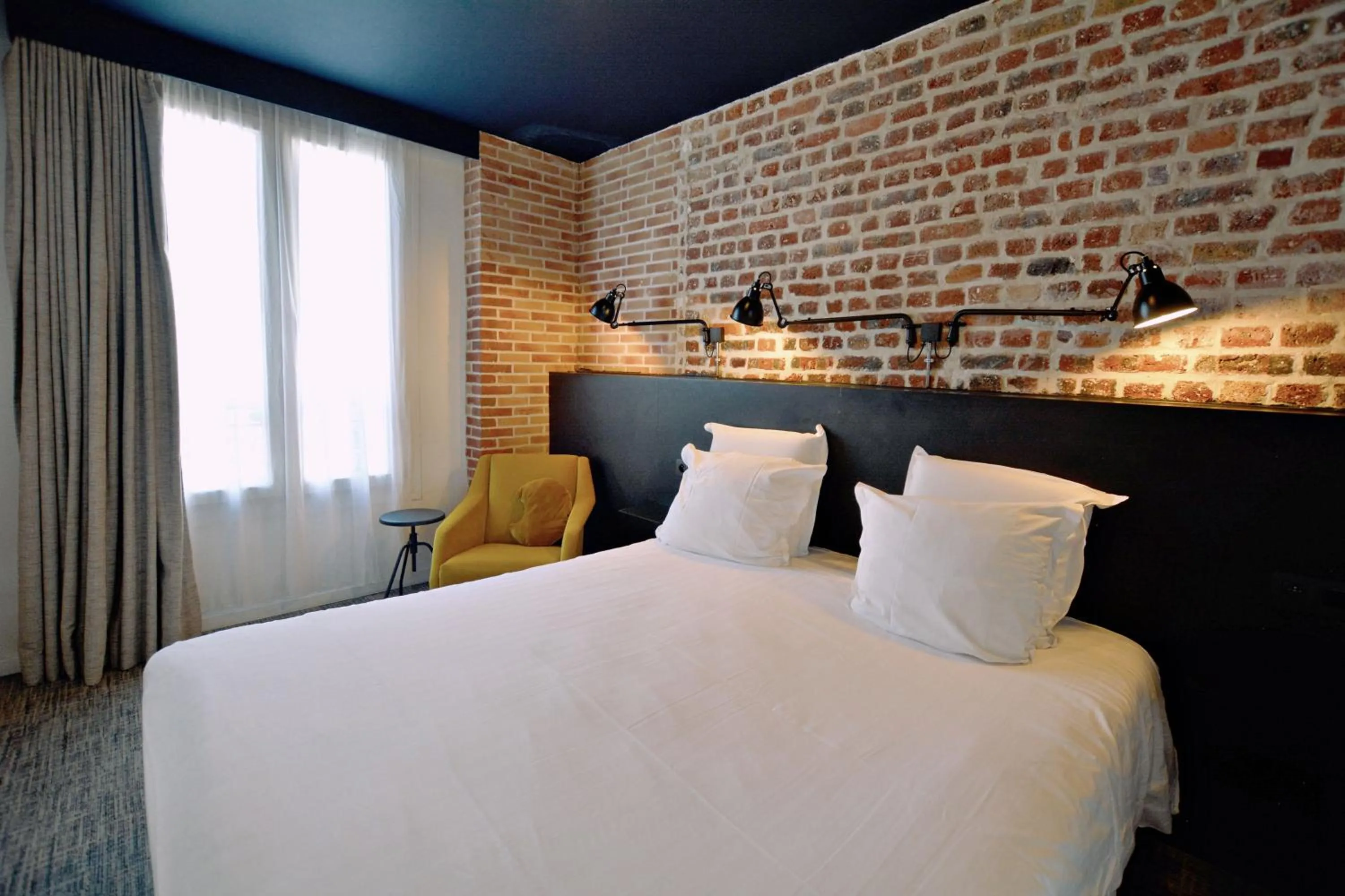 Bed in Hôtel Lucien