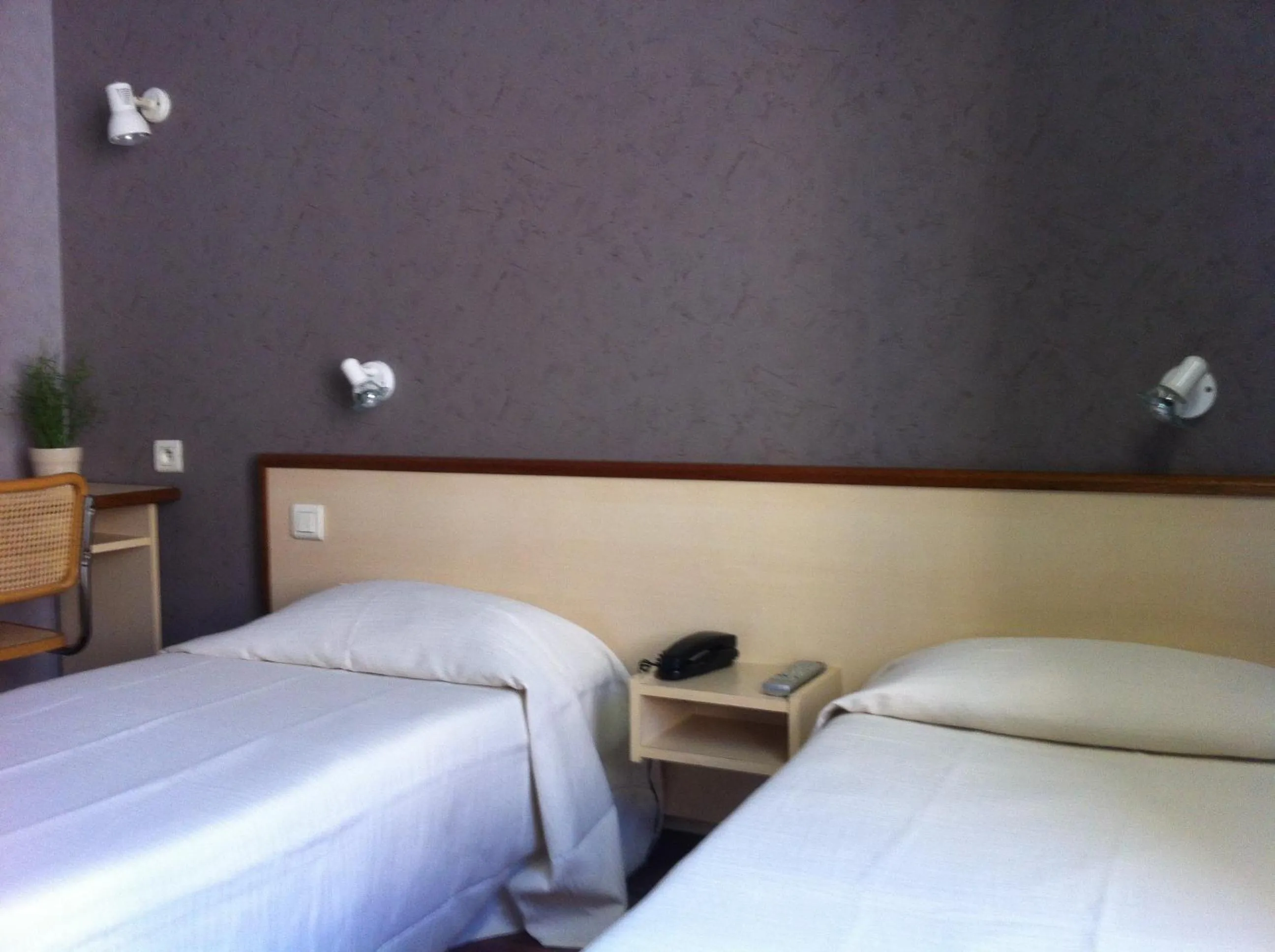 Bed in Hôtel du Sud Vieux Port