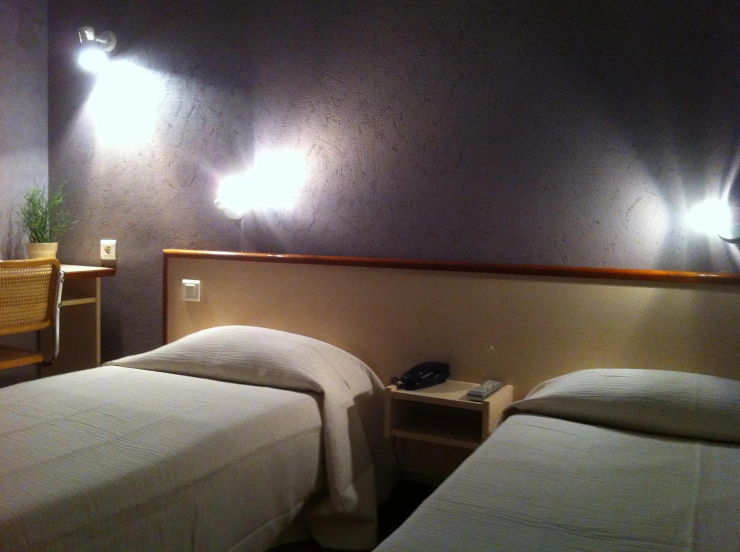 Bed in Hôtel du Sud Vieux Port