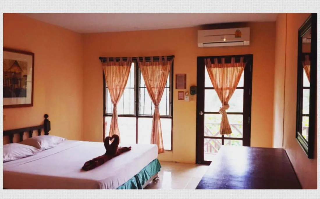 Bed in Tropical Garden Bungalow