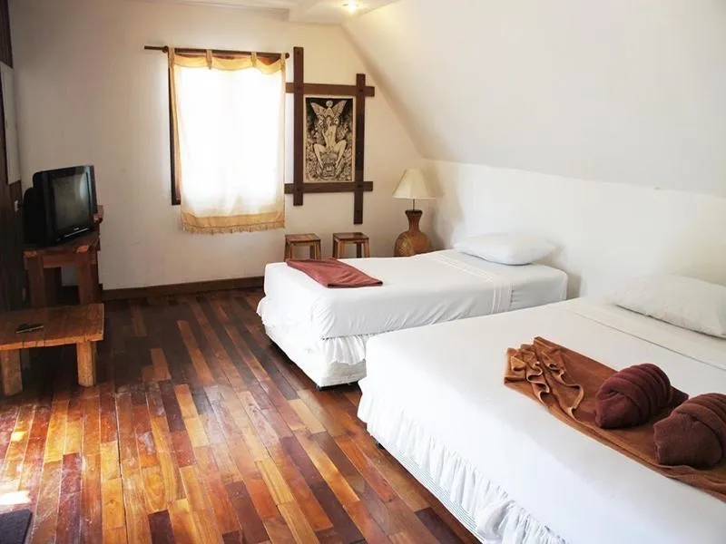 Bed in Tropical Garden Bungalow