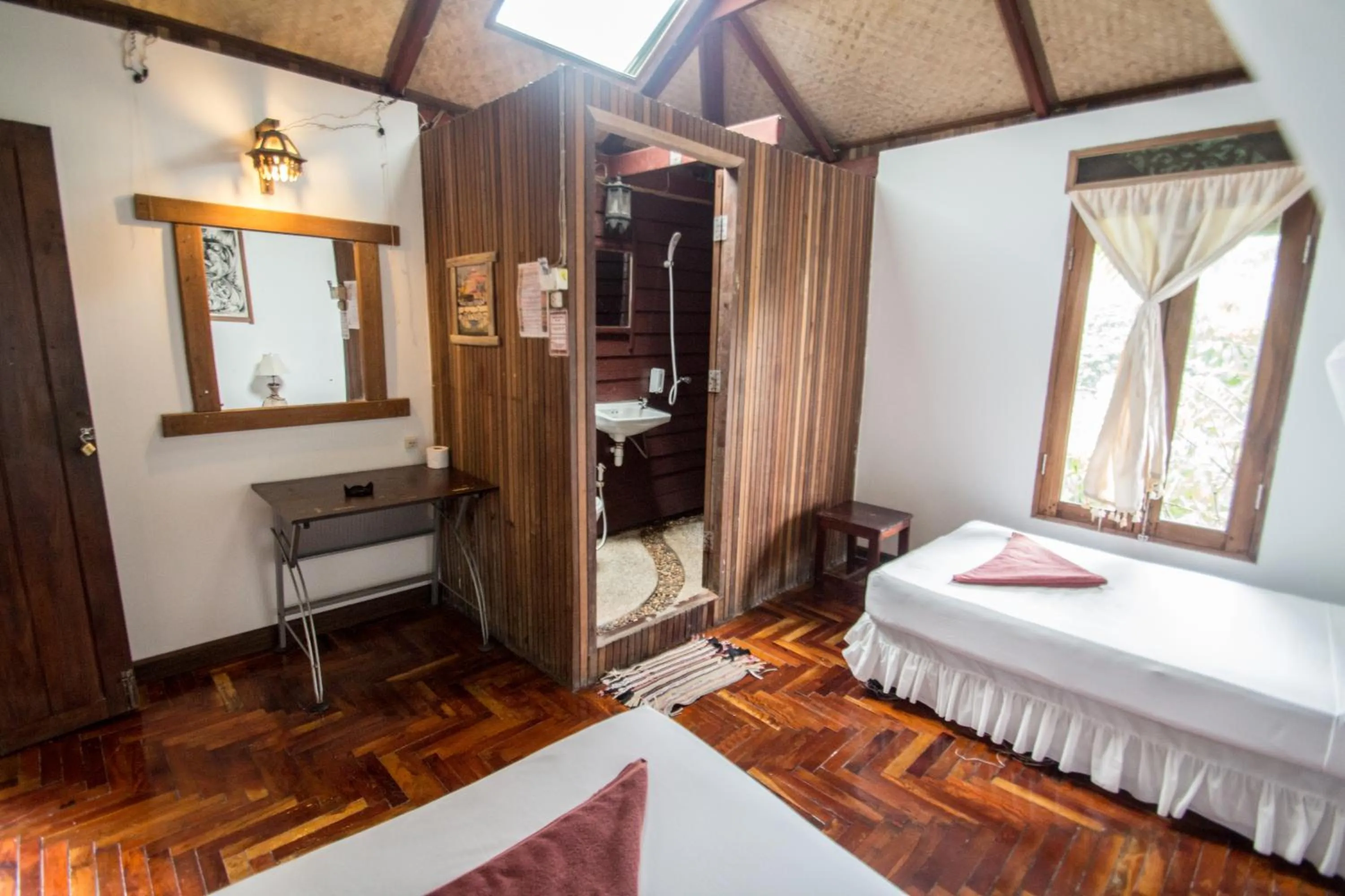 Bed in Tropical Garden Bungalow