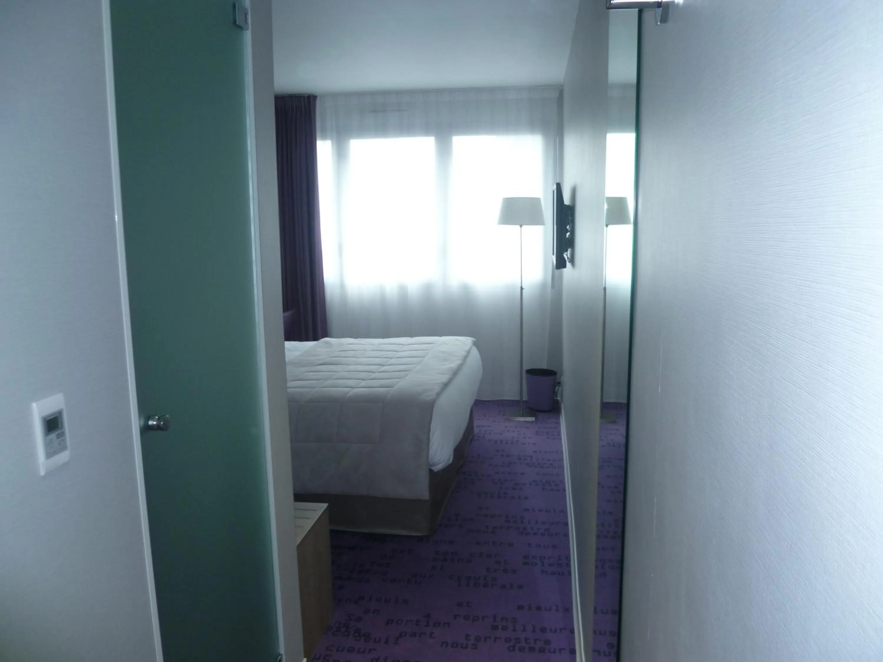 Photo of the whole room, Bed in Hôtel Anne De Bretagne