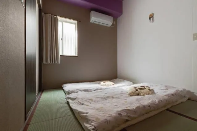 Bed in Osaka Nakayama Guesthouse