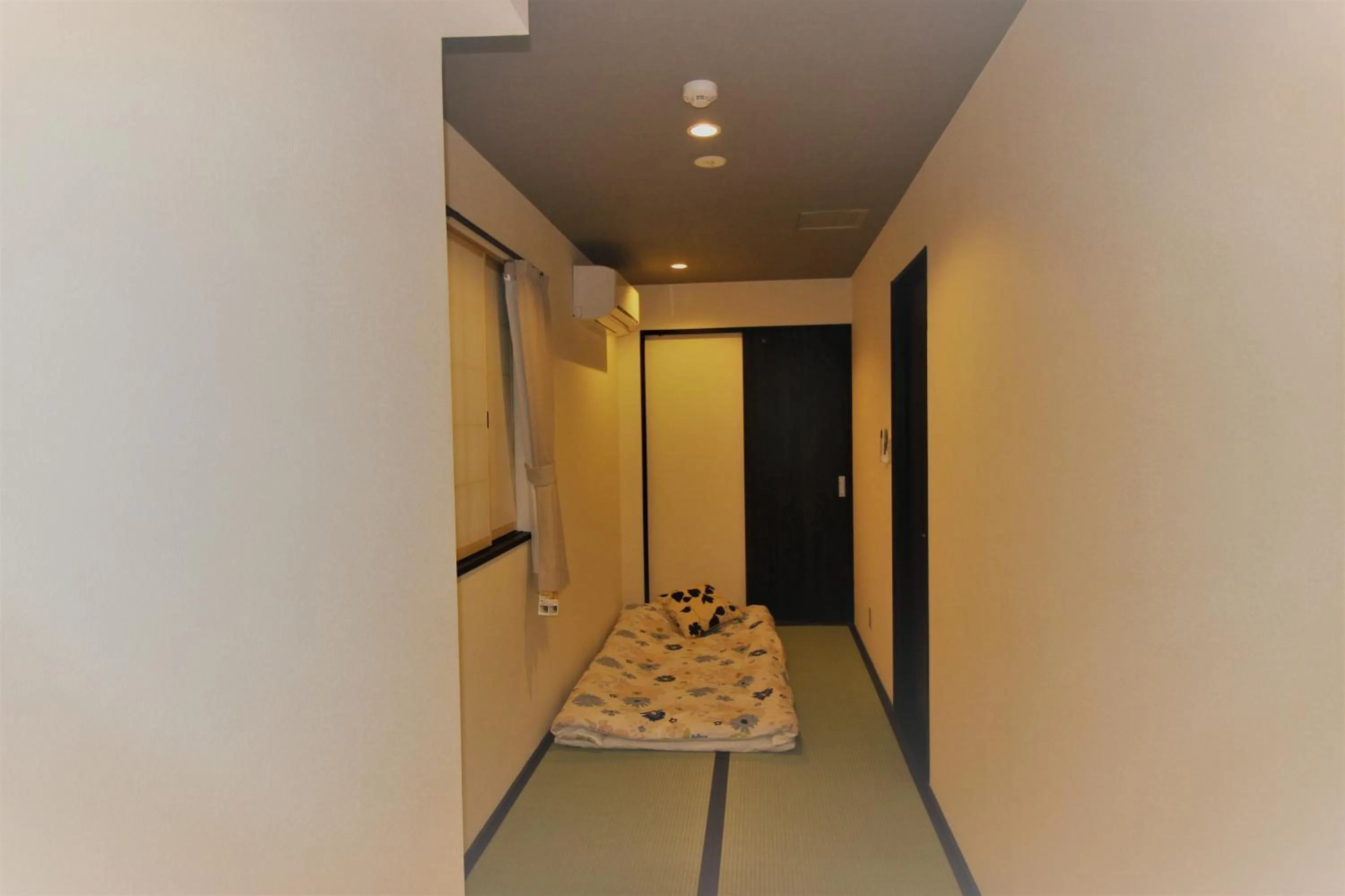 Bed in Osaka Nakayama Guesthouse