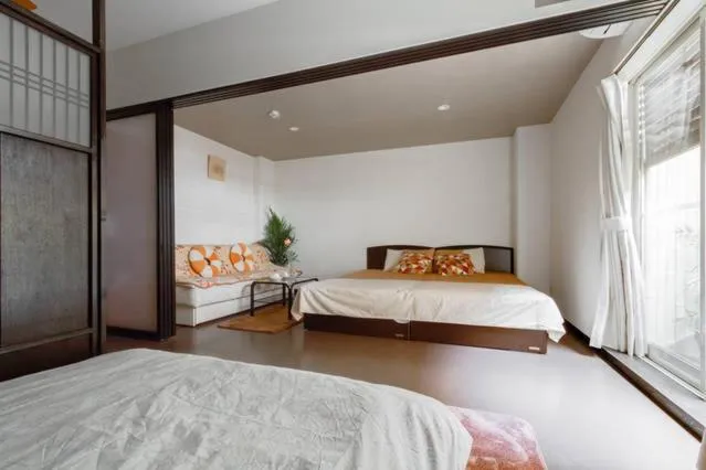 Bedroom, Bed in Osaka Nakayama Guesthouse