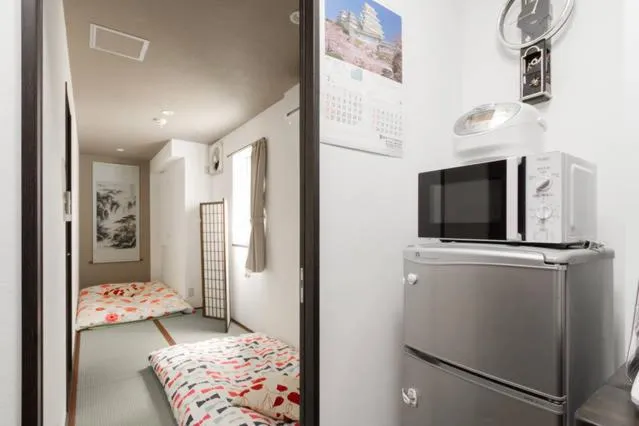 Bed in Osaka Nakayama Guesthouse