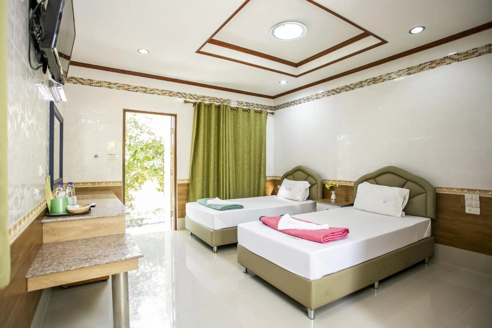 Photo of the whole room, Bed in Bualuang Boutique Resort