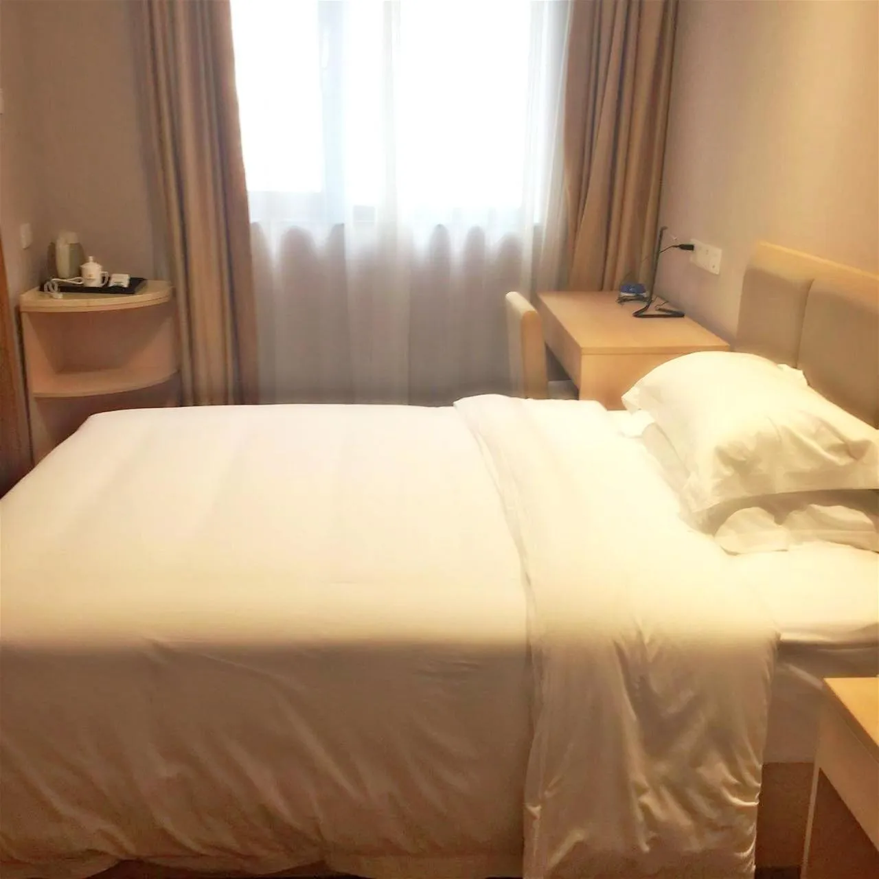 Bed in Xijiao Hotel Beijing