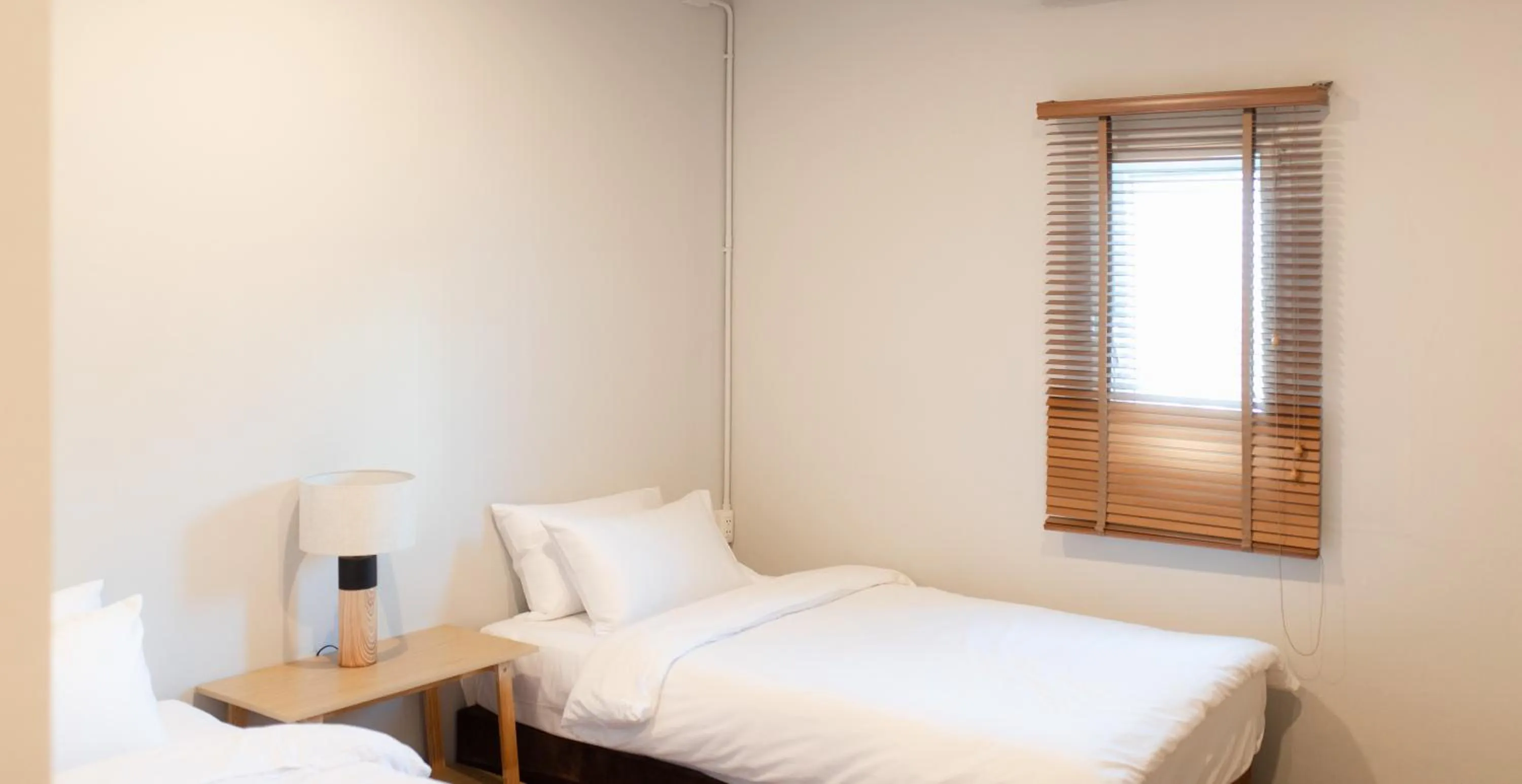 Bed in Hotel PaPa Bangkok Siriraj