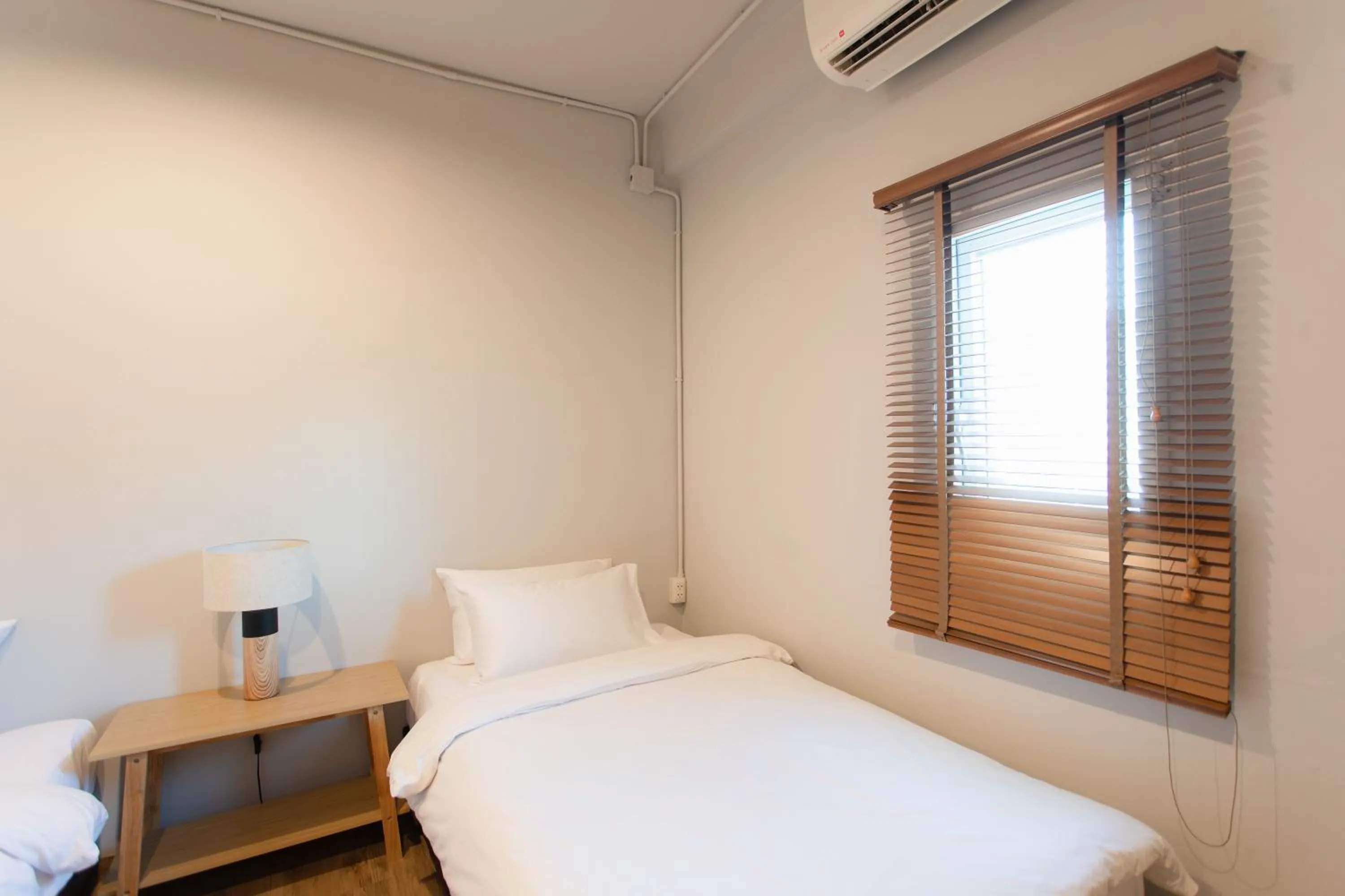 Bed in Hotel PaPa Bangkok Siriraj