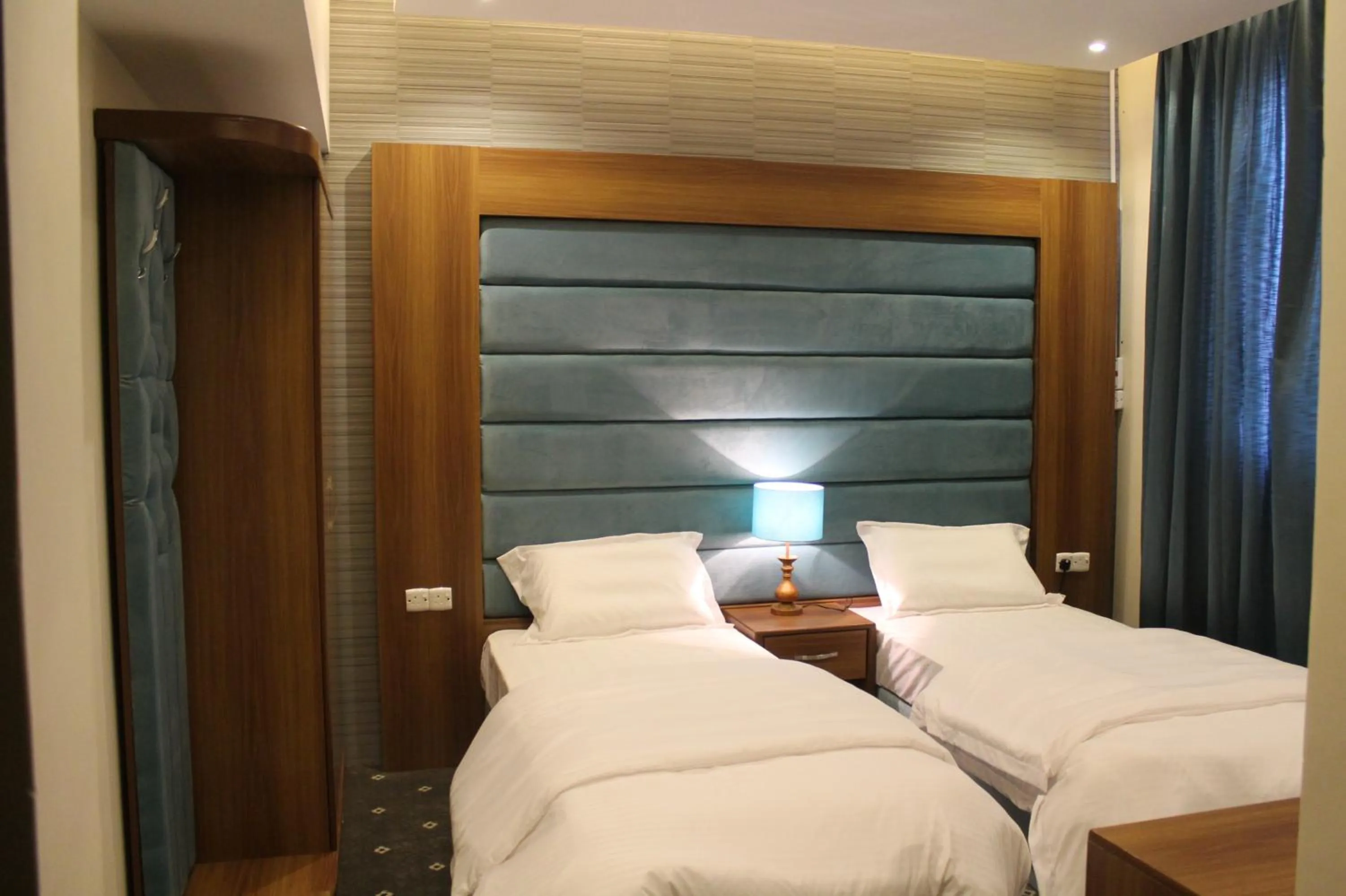 Photo of the whole room, Bed in Desert Rose