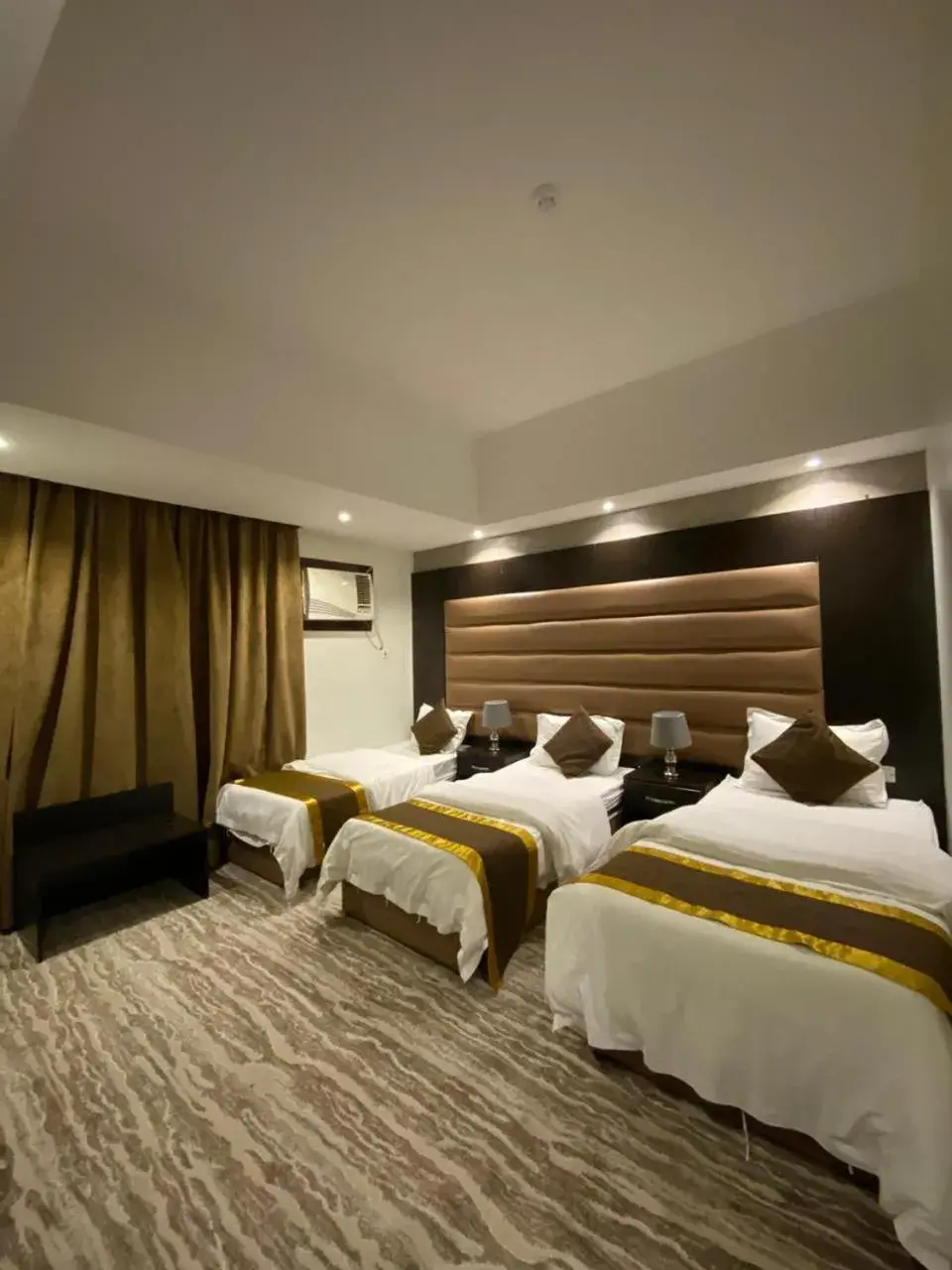 Economy Triple Room in Desert Rose Economy Triple Room in Desert Rose