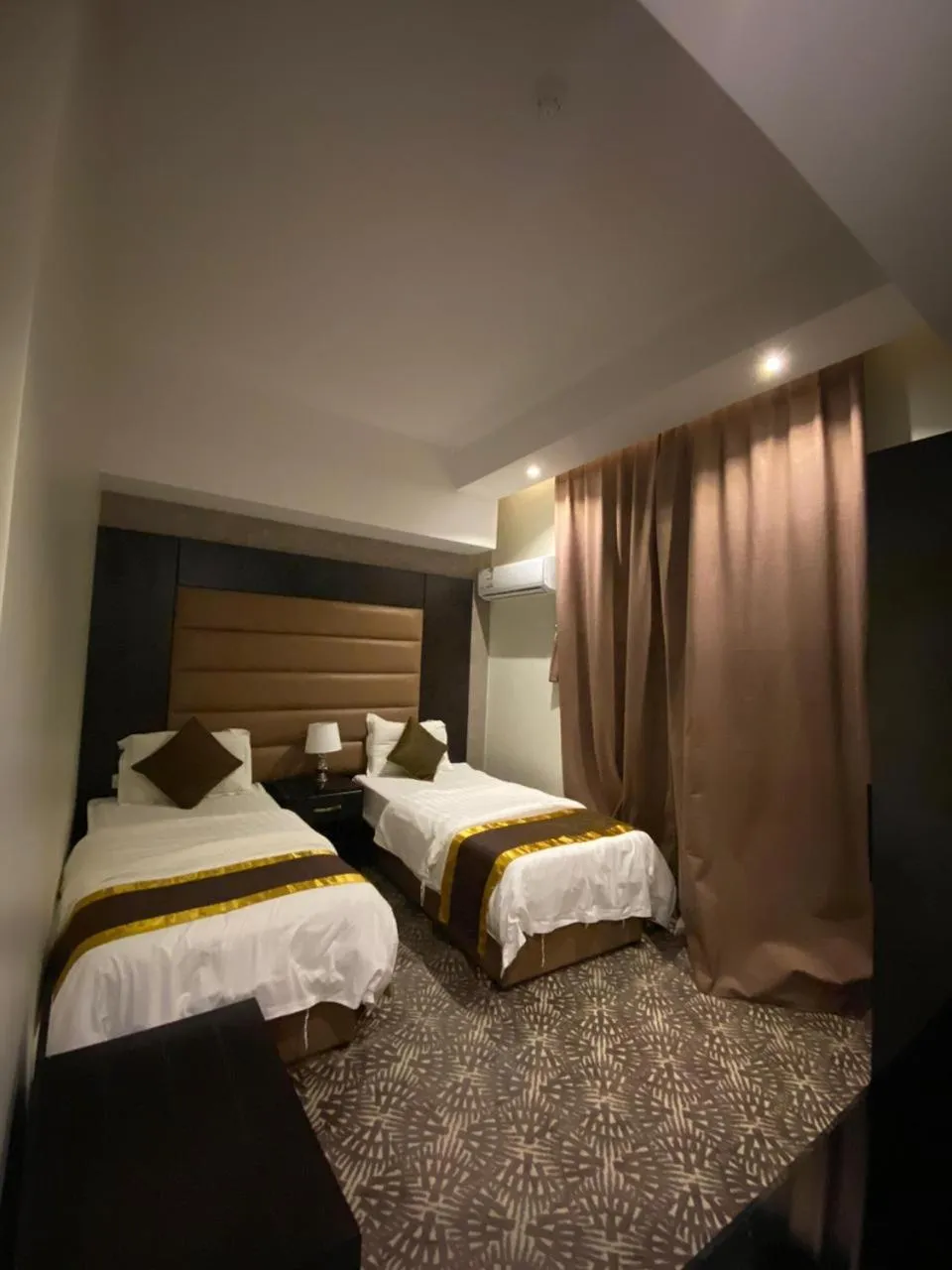 Photo of the whole room, Bed in Desert Rose