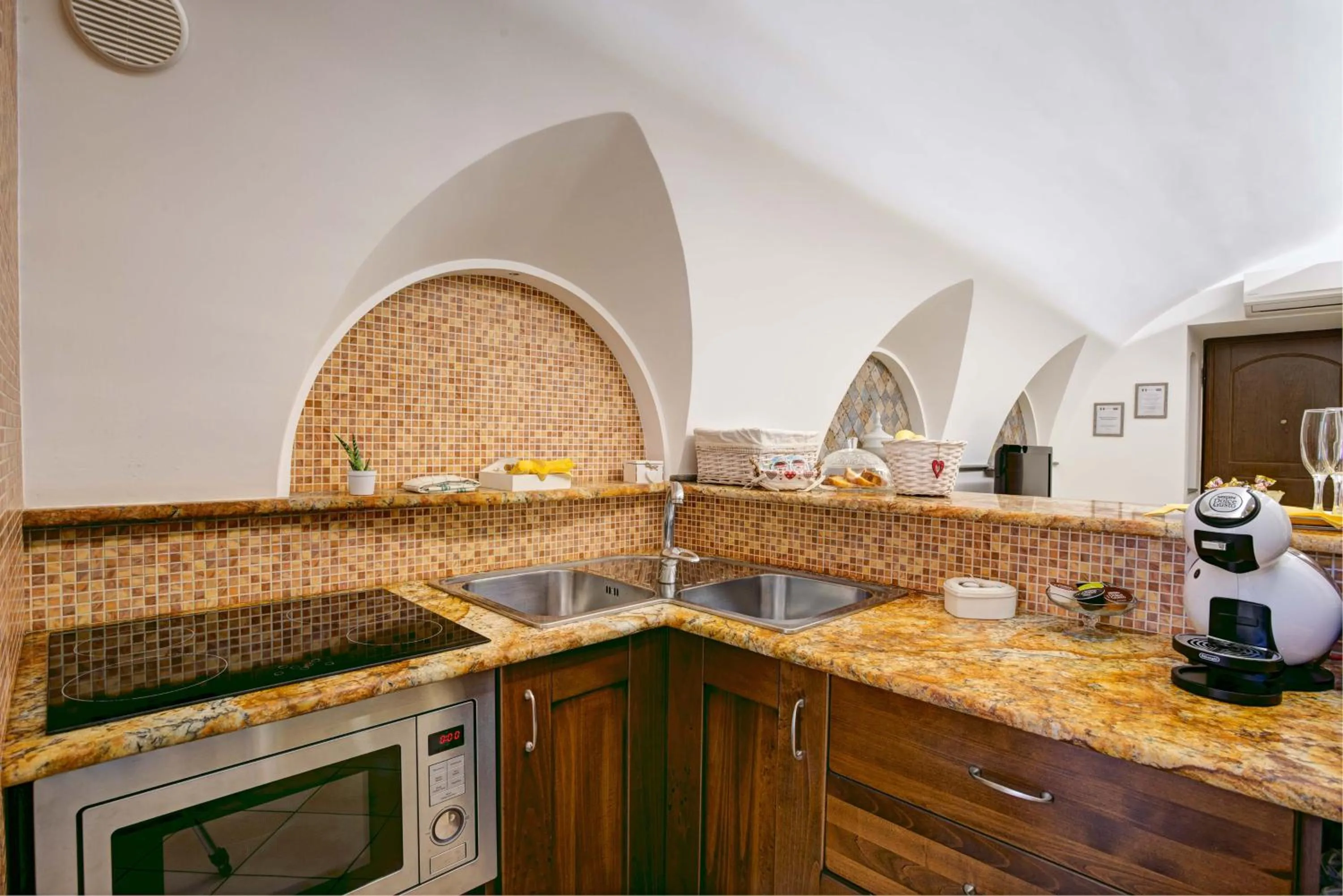 Kitchen or kitchenette in Cuore di Sorrento Suites