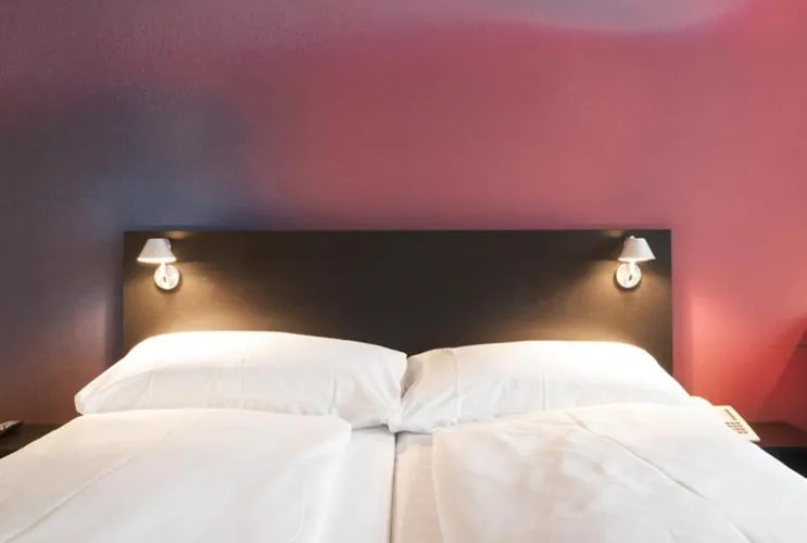 Bedroom, Bed in Hotel Montana Zürich