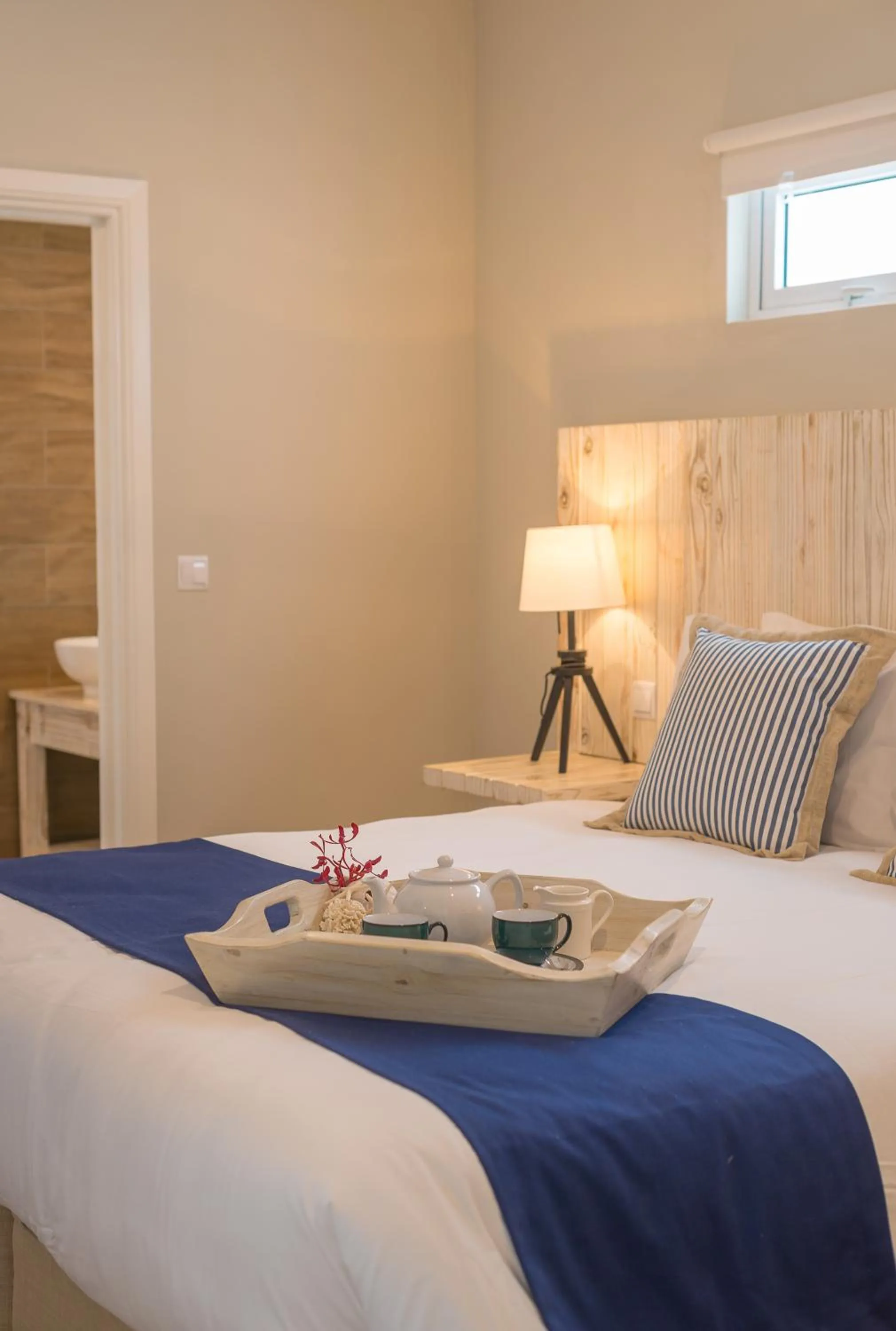 Bed in Le Nautique Beachfront Apartments