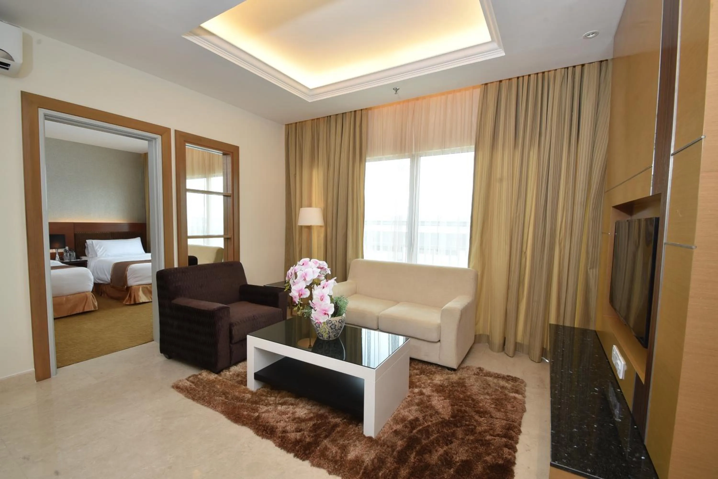 Living room, Bed in Tenera Hotel