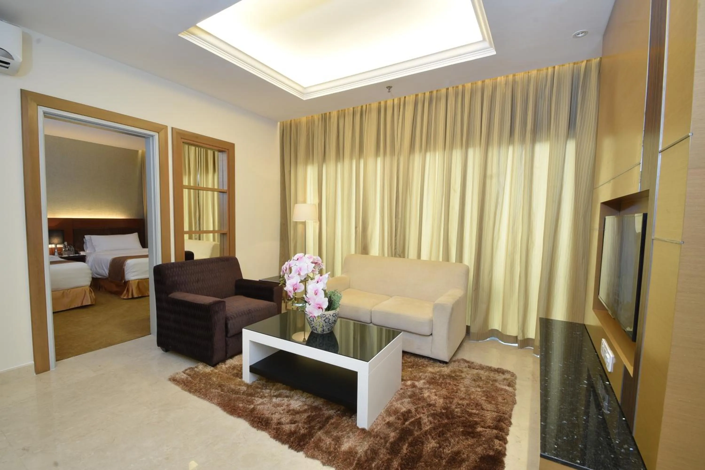 Living room, Bed in Tenera Hotel