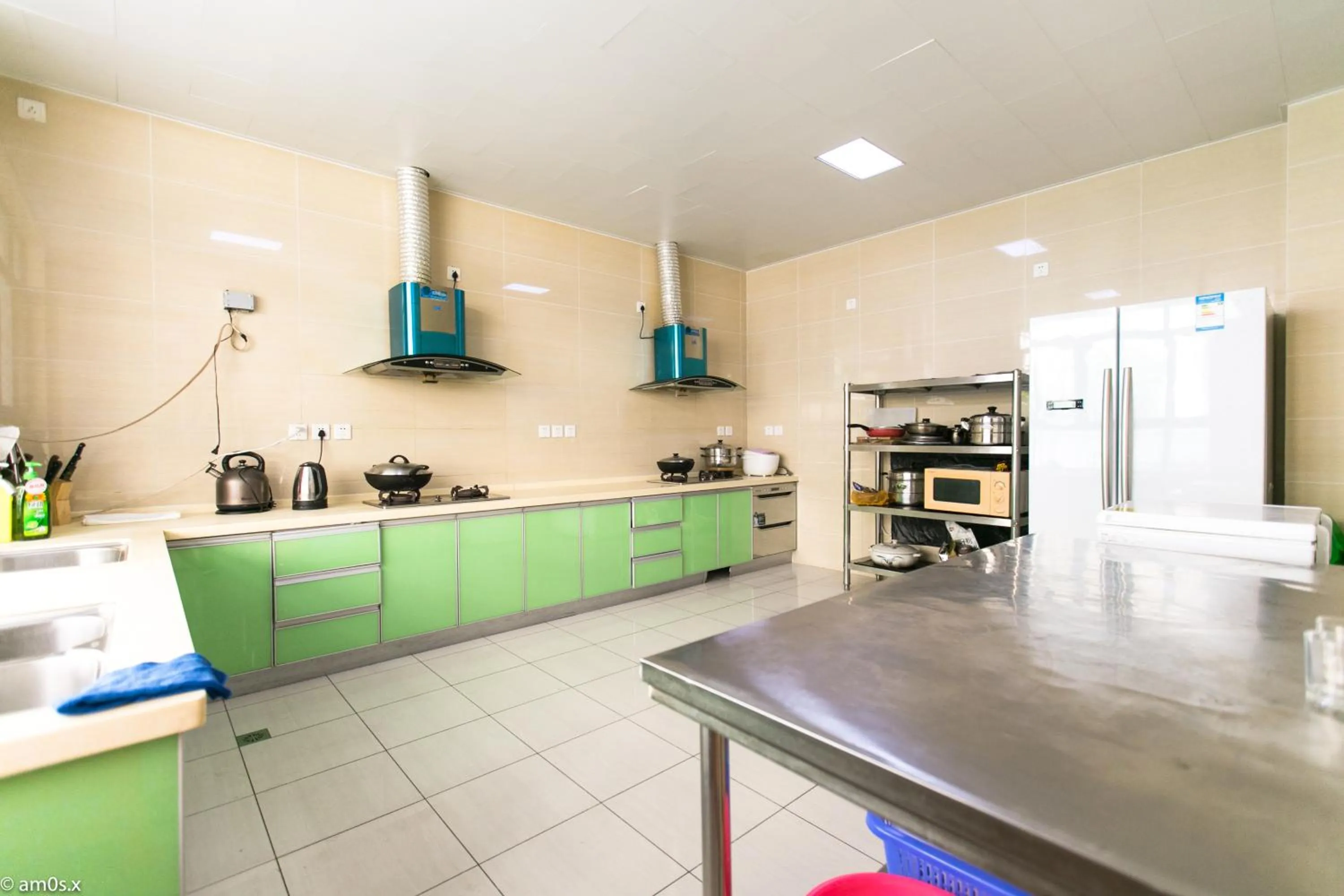 Kitchen or kitchenette in Sanya Passion fruit Inn