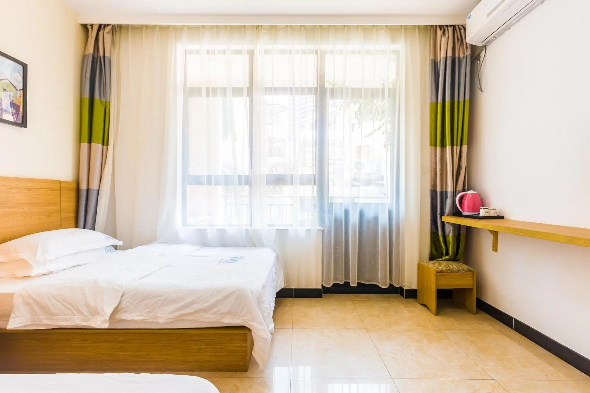 Photo of the whole room, Bed in Sanya Passion fruit Inn