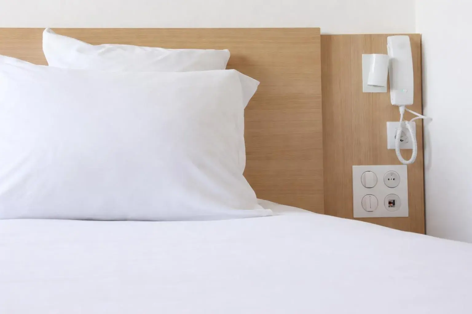 Bed in Geographotel Paris-Roissy CDG Airport Bed in Geographotel Paris-Roissy CDG Airport