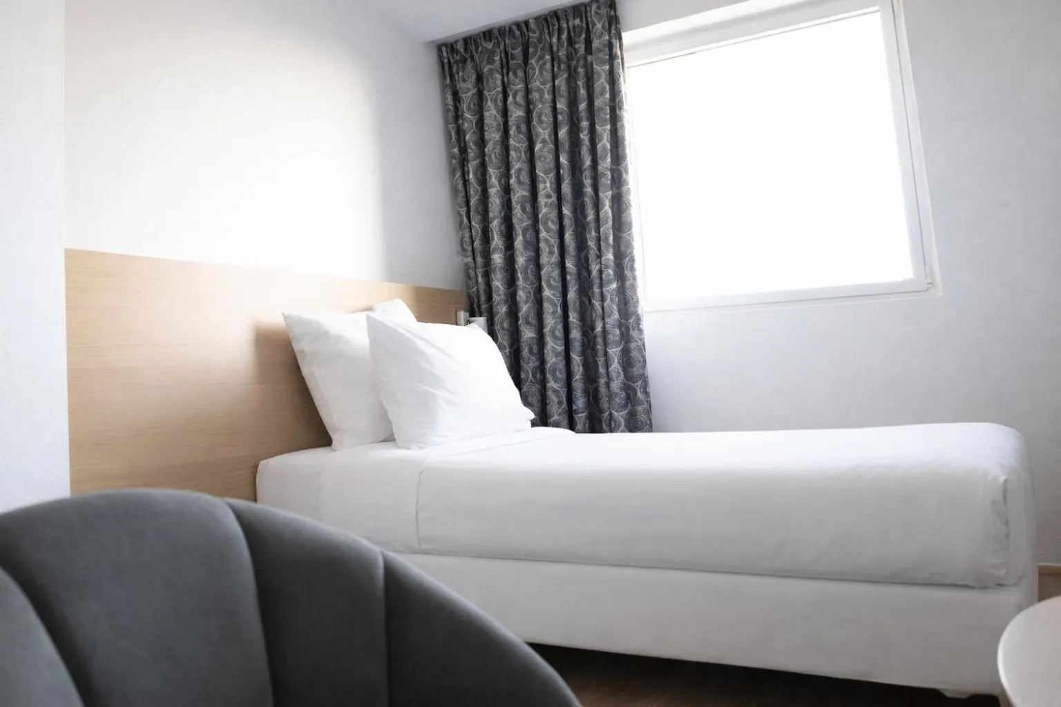 Bed in Geographotel Paris-Roissy CDG Airport