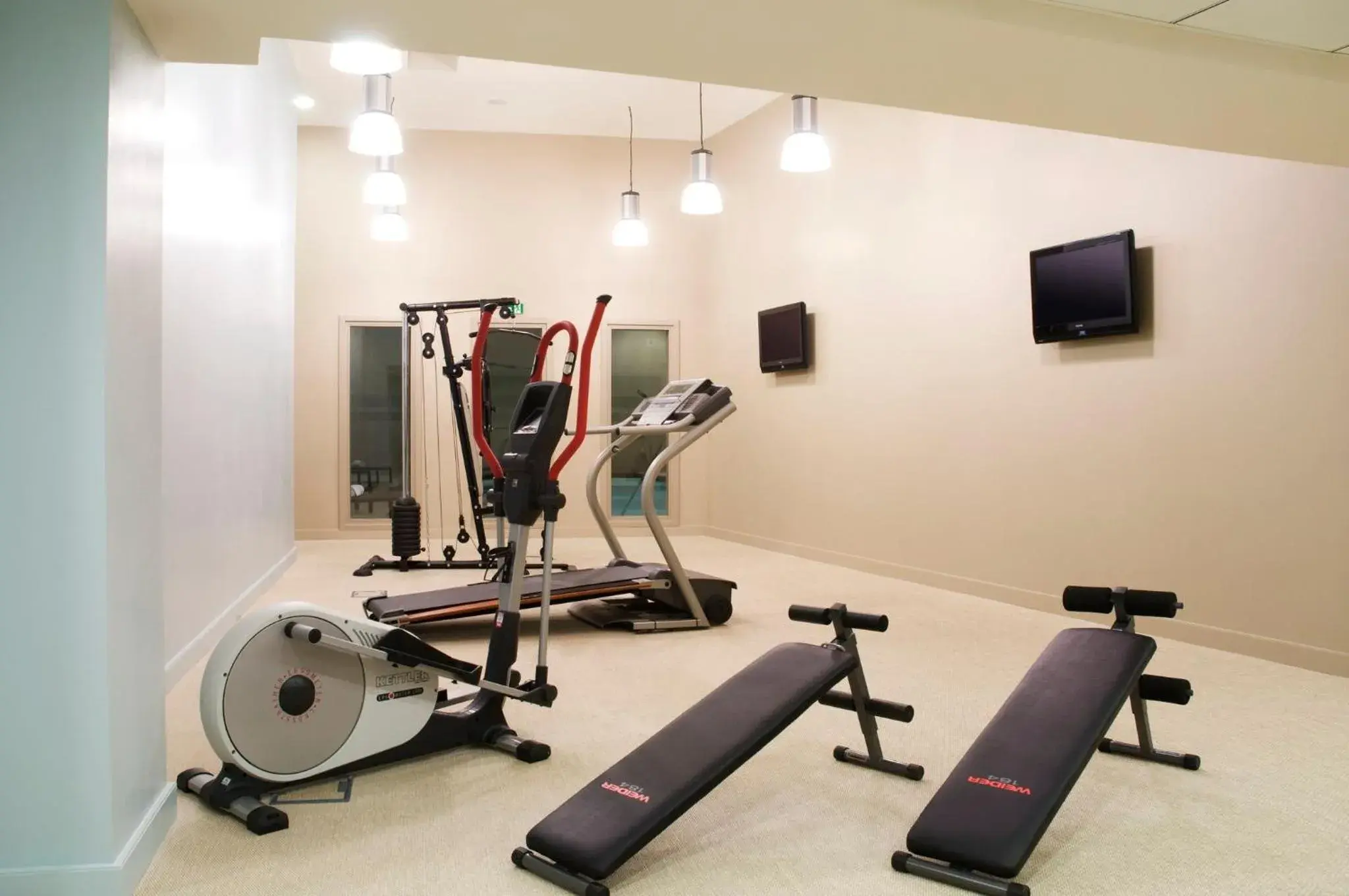 Fitness centre/facilities in Holiday Inn Mulhouse by IHG Fitness centre/facilities in Holiday Inn Mulhouse by IHG
