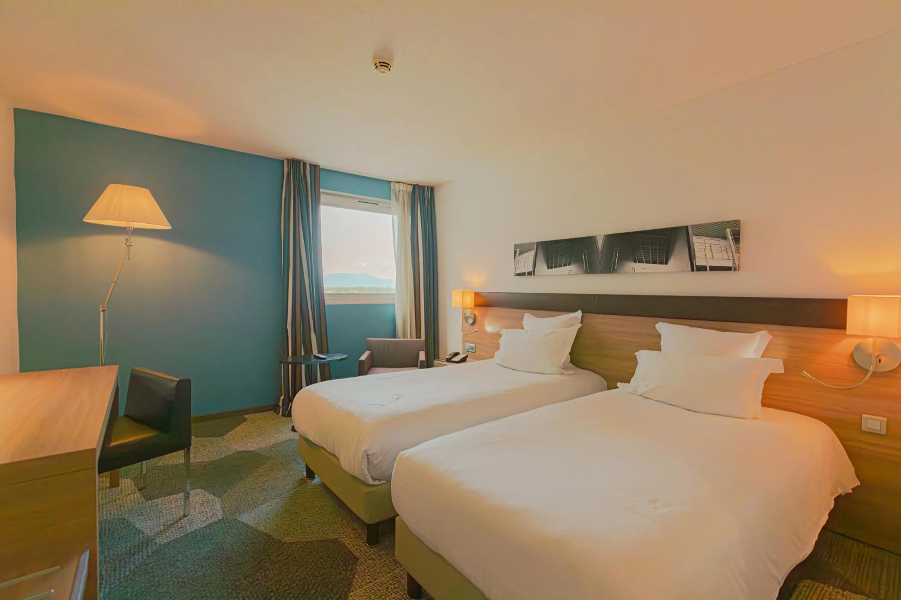 Bed in Holiday Inn Mulhouse by IHG