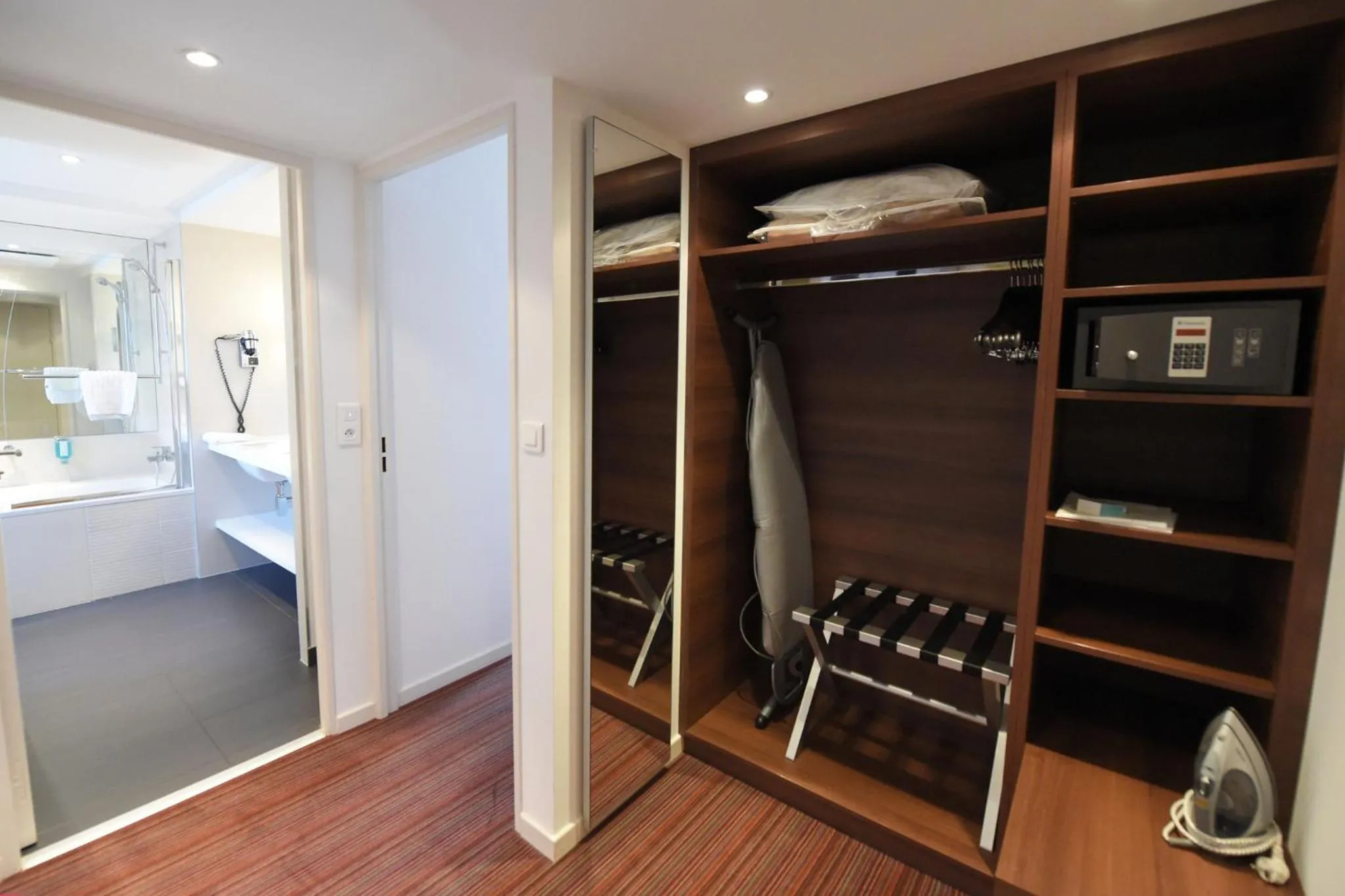 Bedroom in Holiday Inn Mulhouse by IHG