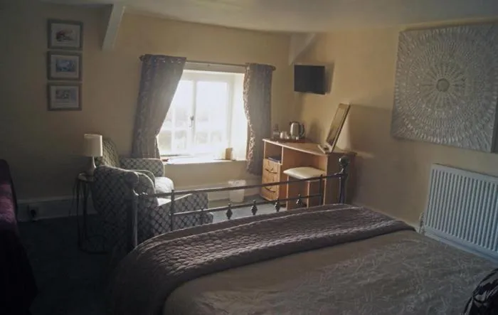 Bed in The Old Smithy Bed & Breakfast