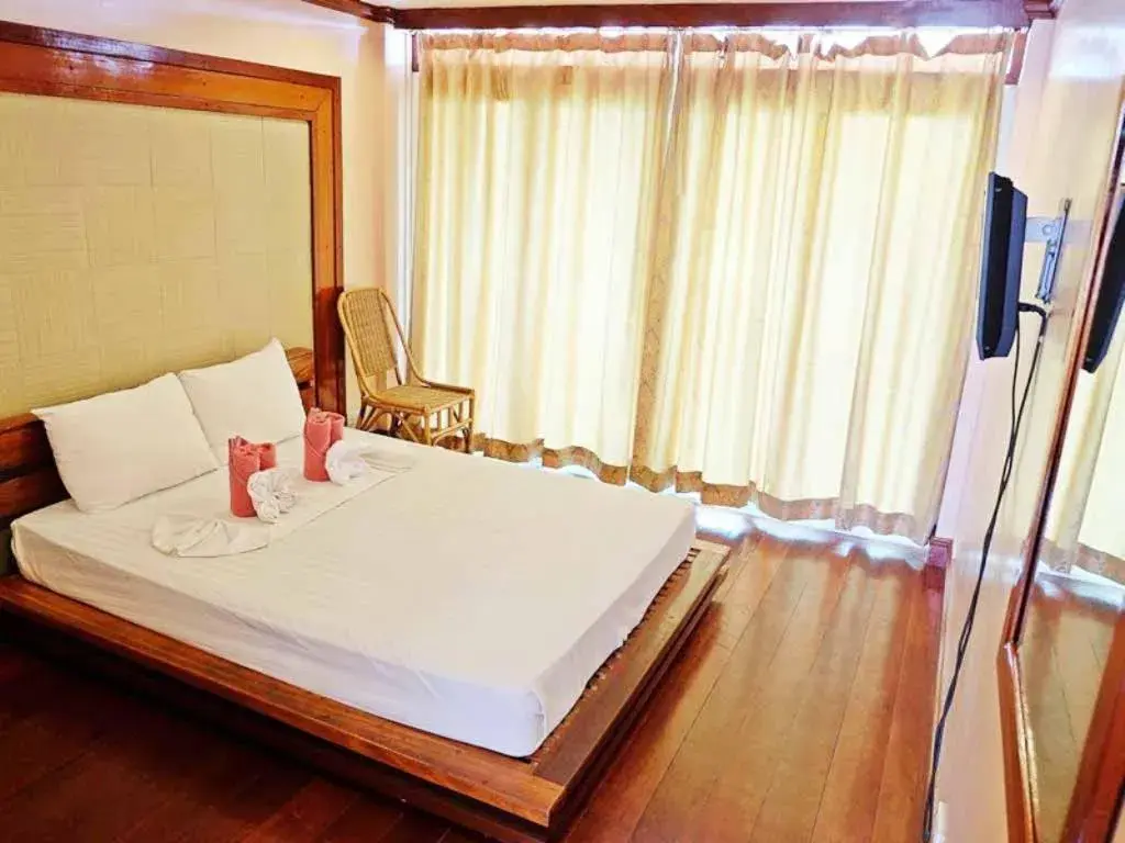 Balcony/Terrace, Bed in El Nido Beach Hotel Balcony/Terrace, Bed in El Nido Beach Hotel