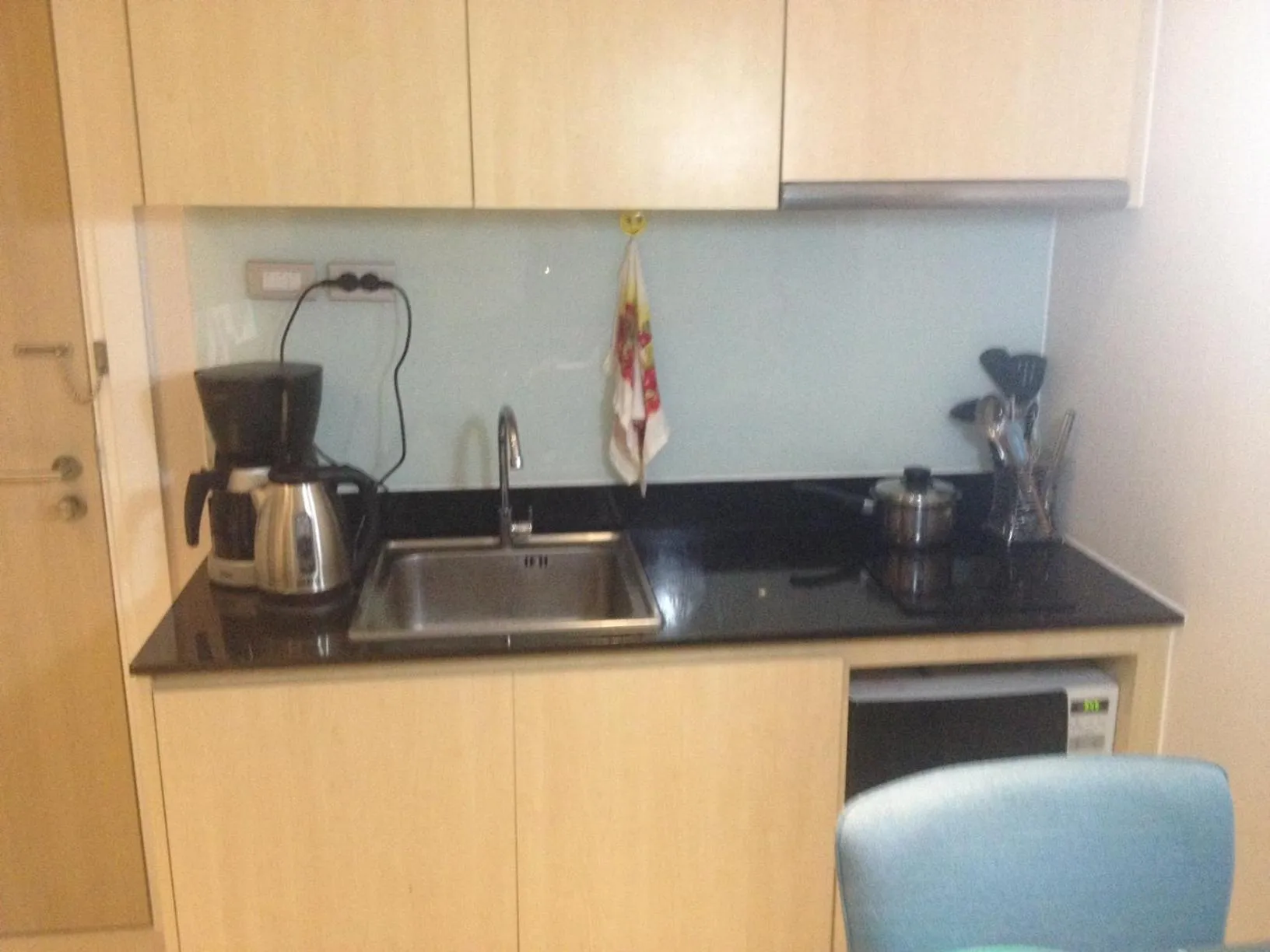 Kitchen or kitchenette in Grande Caribbean Resort 17th floor by Bell-Turner