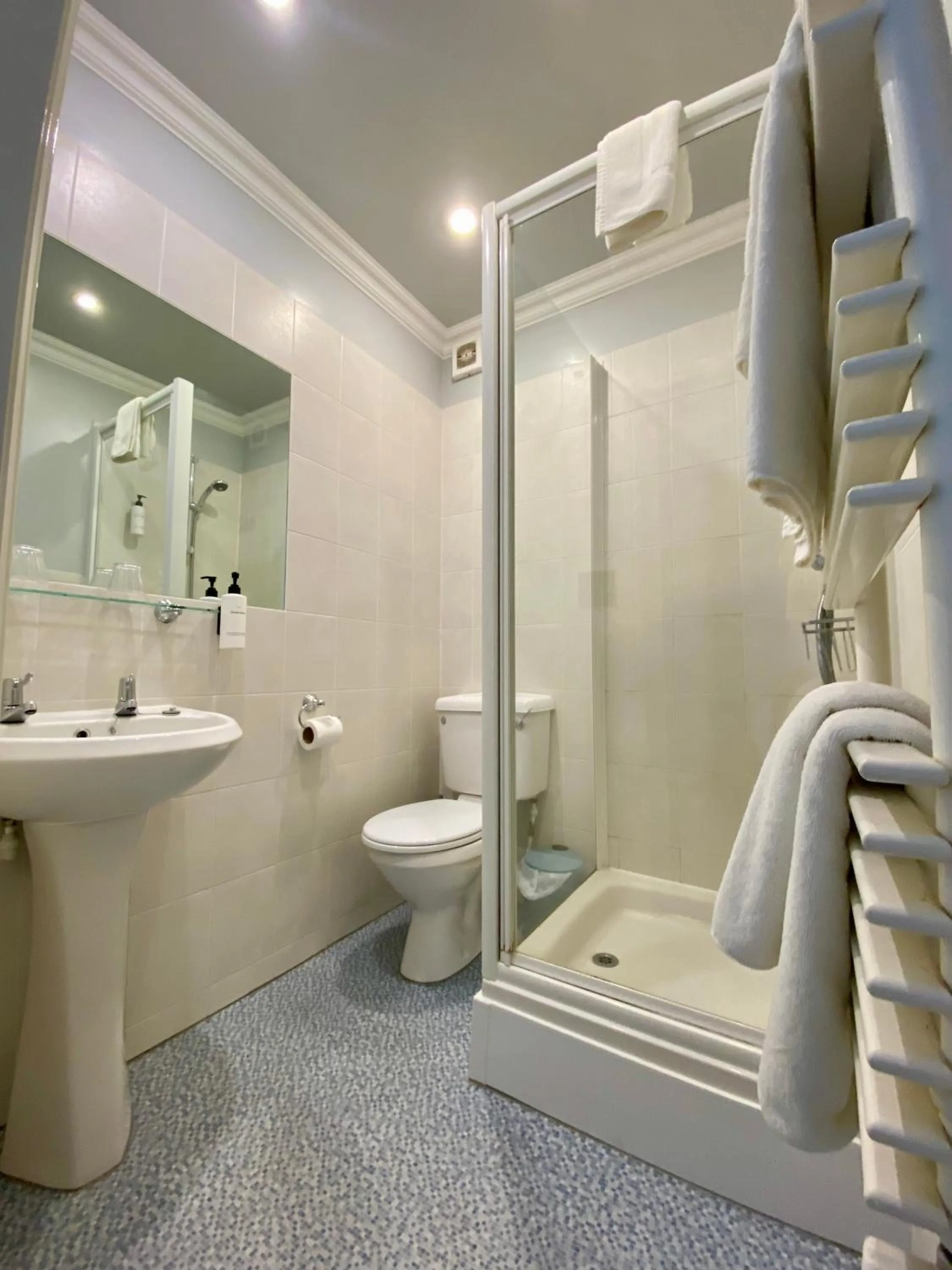 Shower in East Beach Hotel