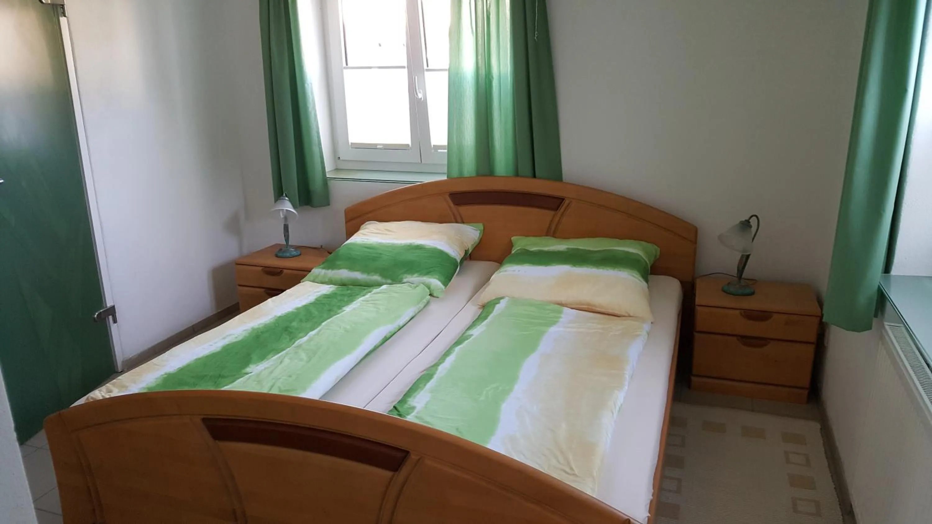 Bed in Ferienwohnung Alwind 5