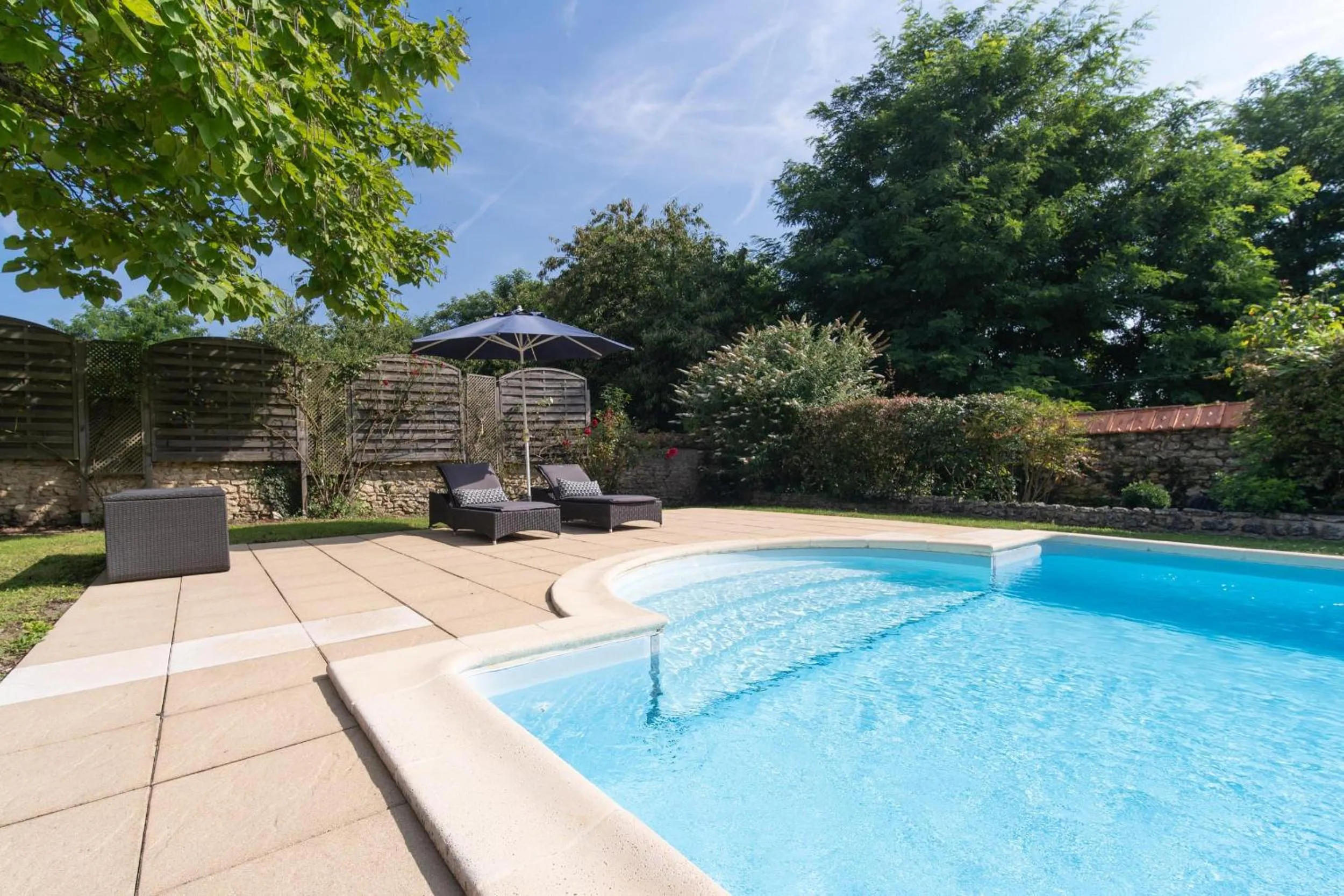 Pool view in Le Clos de La Rousselière B and B