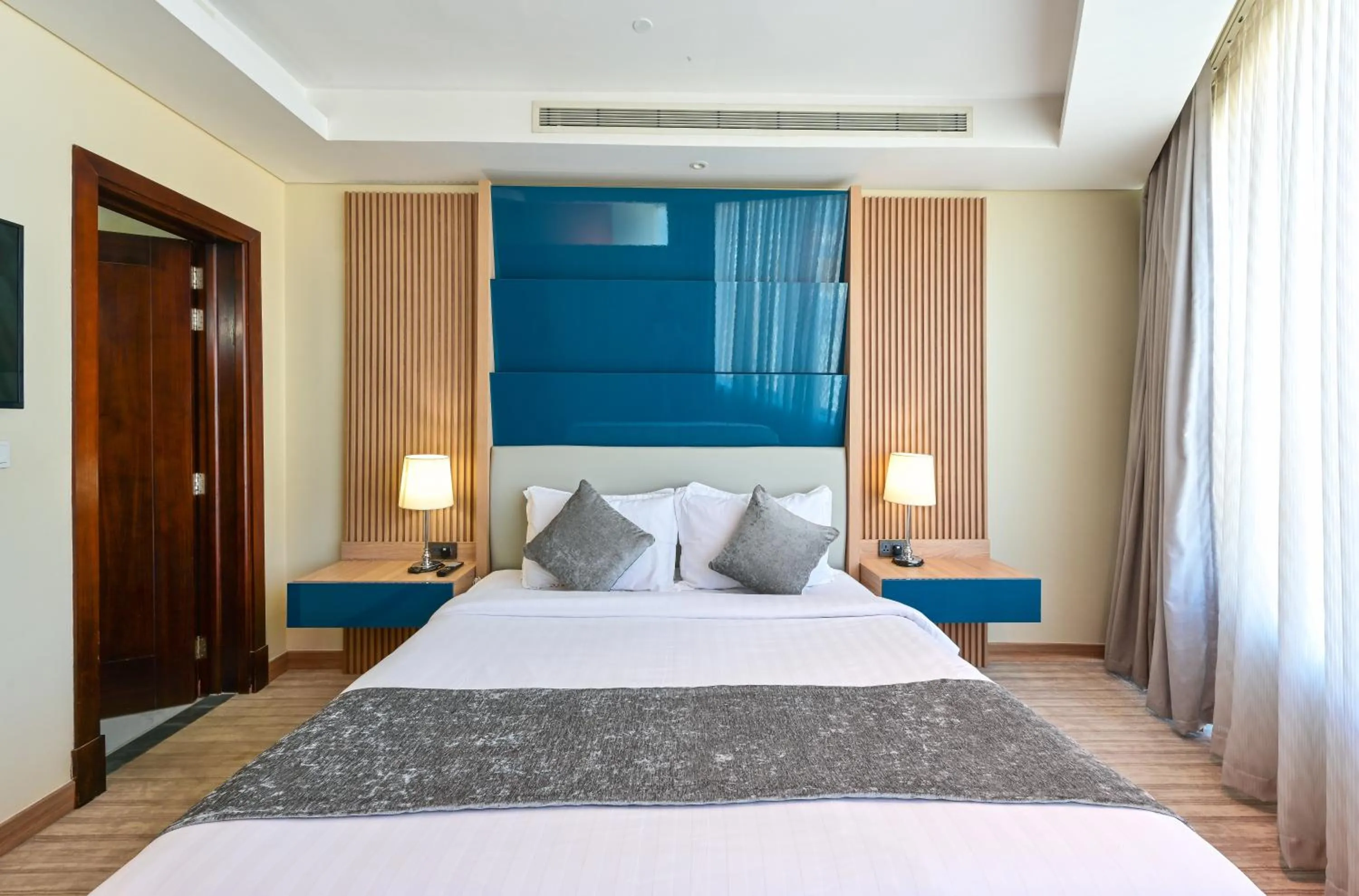 Bed in Al Mansour Suites Hotel