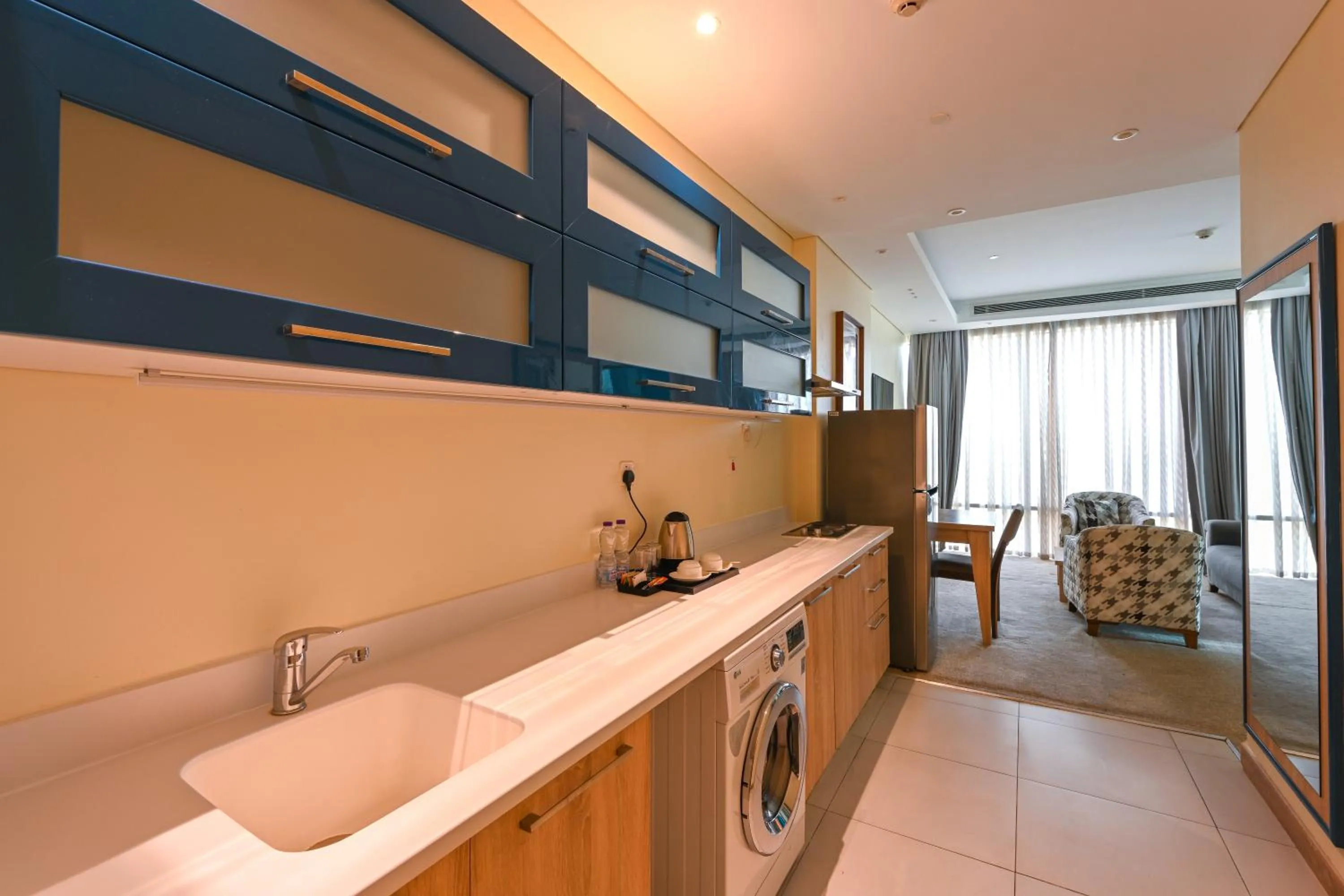 Kitchen or kitchenette in Al Mansour Suites Hotel