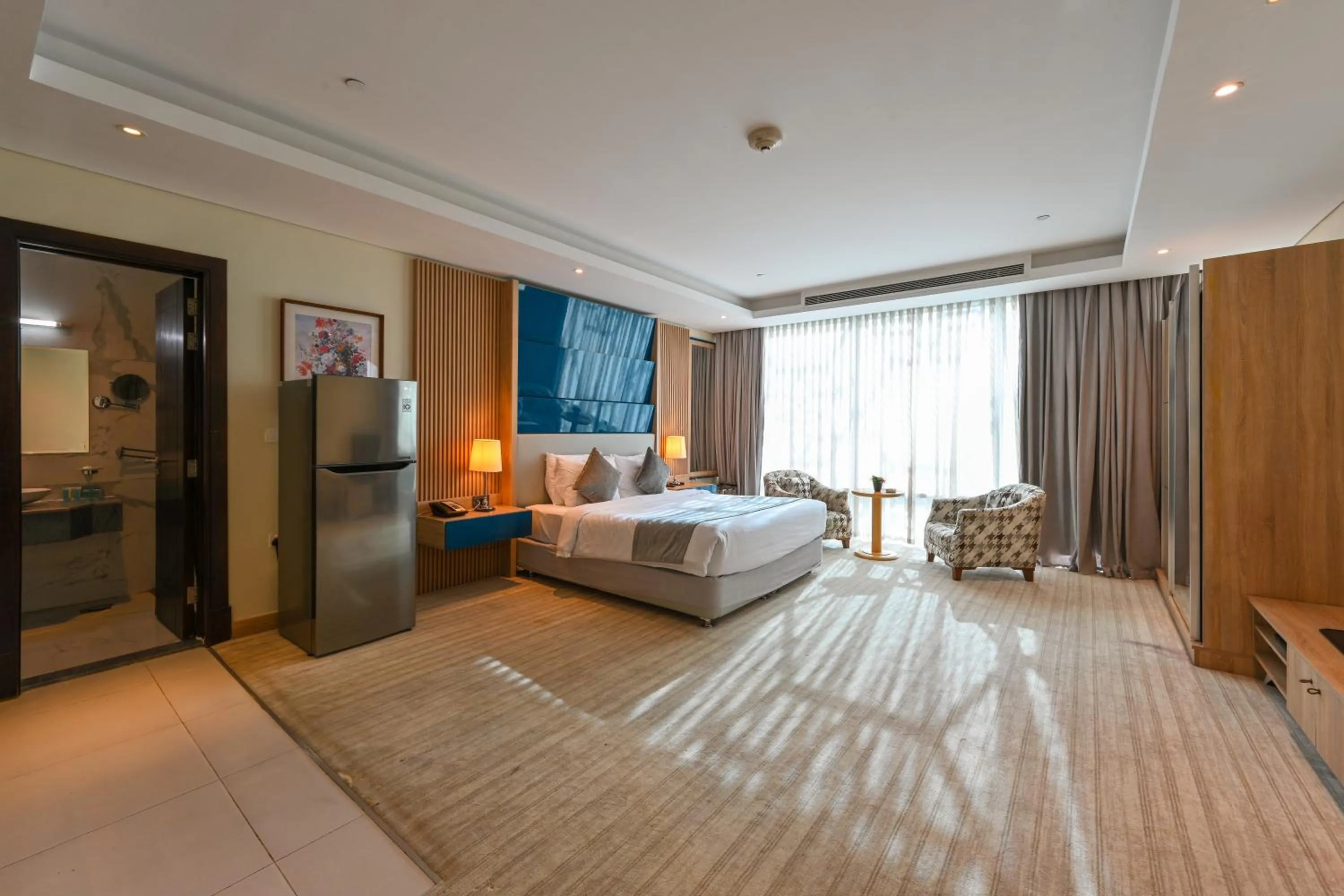 Bed in Al Mansour Suites Hotel