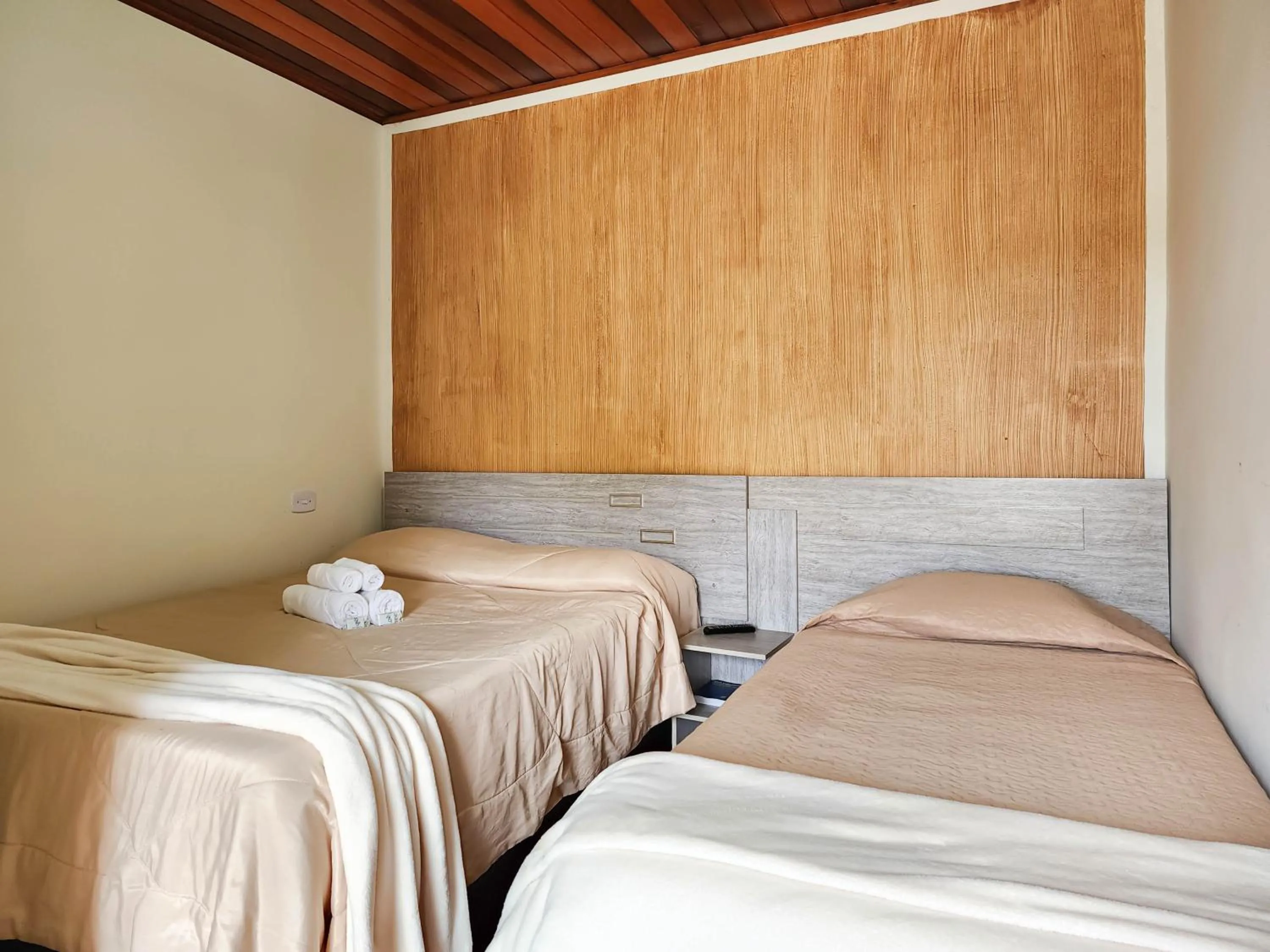 Bed in Pousada Araucária Village